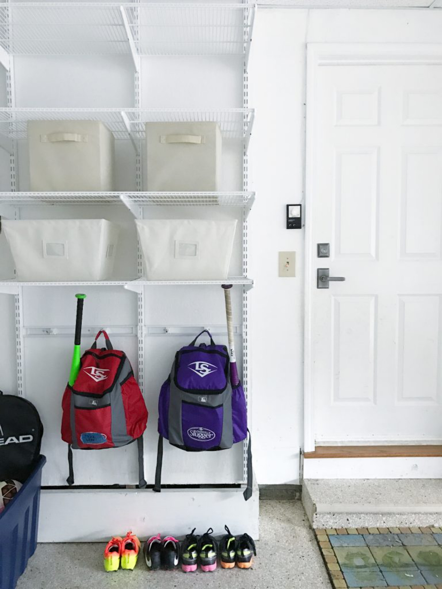 If you don’t have room inside for a mudroom, the wall near your door to the garage is a great spot to create one! In this space I added shelving and hooks to hang those bags. 

#LTKfamily #LTKBacktoSchool #LTKhome