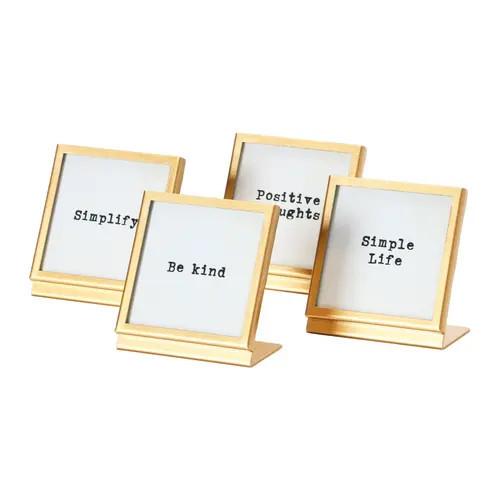 Storied Home gold frame with easel