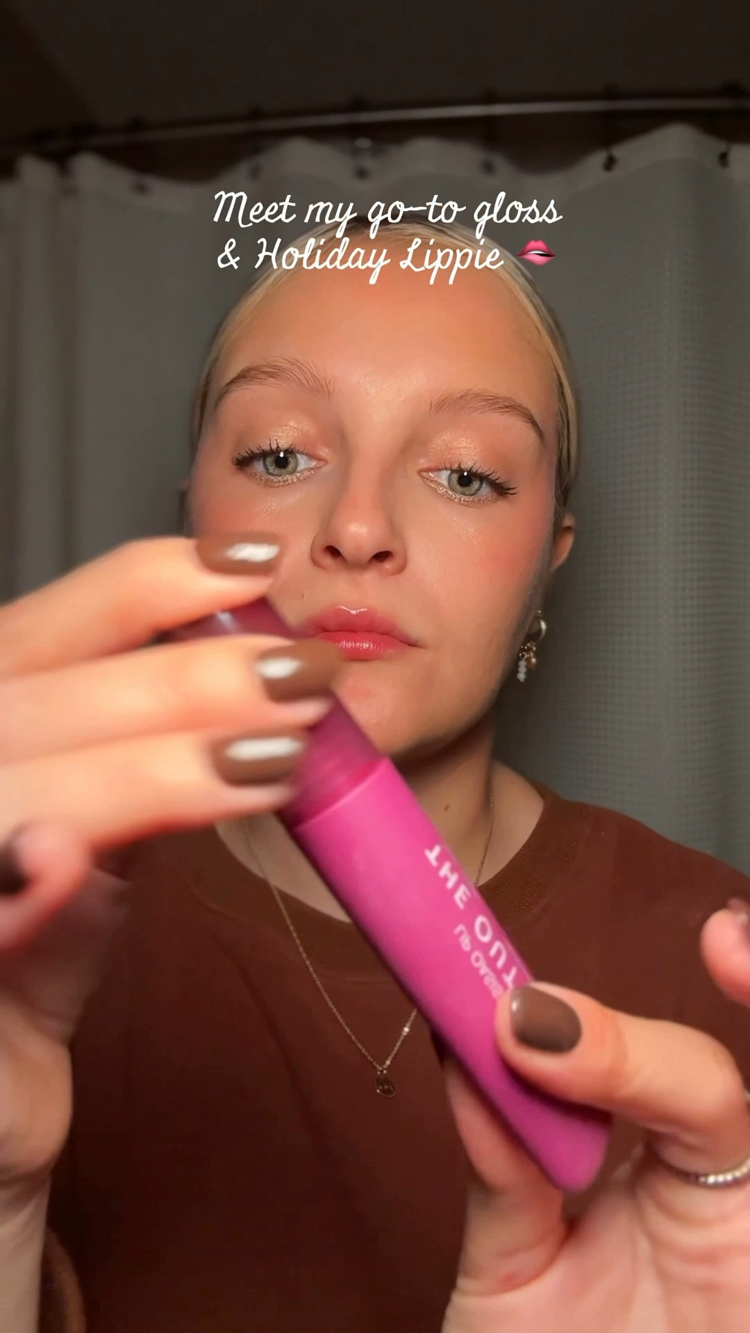 My holiday lip!! This is the perfect, hydrating gloss that gives a fun pop of color from The Outset. #lipgloss #holidaymakeup #selfcare 
