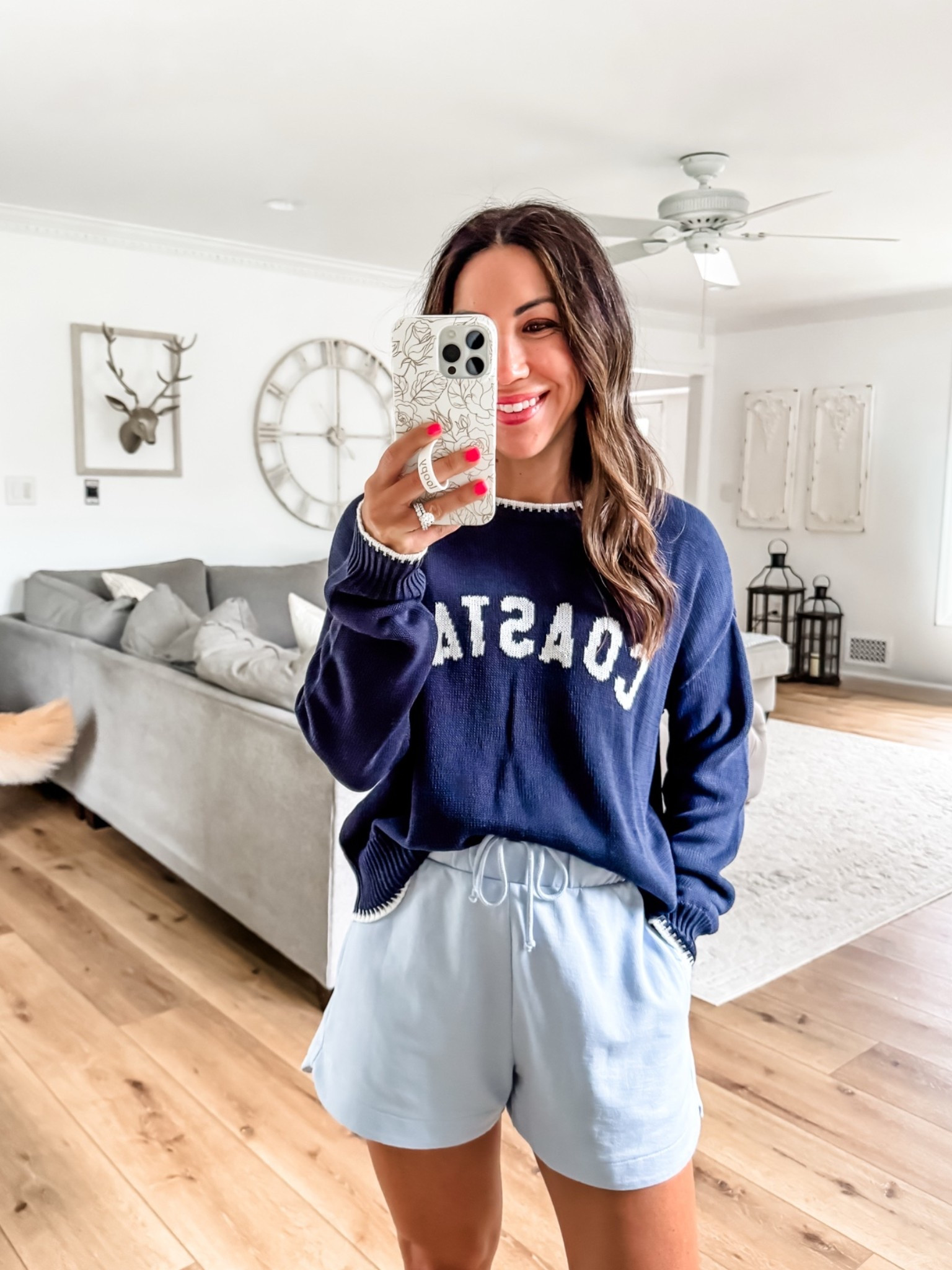 Small coastal sweater. Small blue shorts.

#LTKOver40
