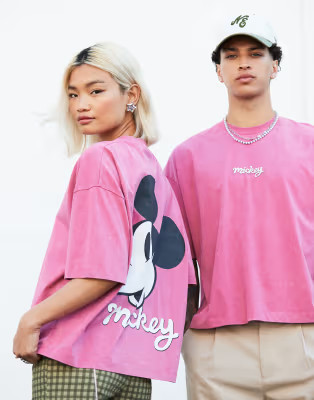 ASOS DESIGN Disney unisex oversized T-shirt with Mickey Mouse print in pink | ASOS (Global)
