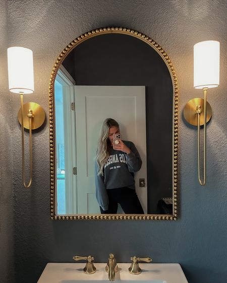 Powder room mirror and sconces in Aged Brass!

bathroom decor, arch mirror, modern wall lights 

#LTKstyletip #LTKhome #LTKsalealert
