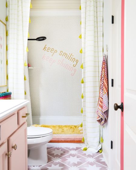 Adding tile stickers to both of my daughters’ bathrooms was such a game changer! It totally changed their space, and they have held up so well! #tilestickers #bathroom #flooring #tile #bathroomupdate #bathroommakeover #colorfuldecor #girlsbathroom #pinkbathroom #pennytile #modernbathroom #vanity #showercurtain #homedecor #homeupdates

#LTKhome