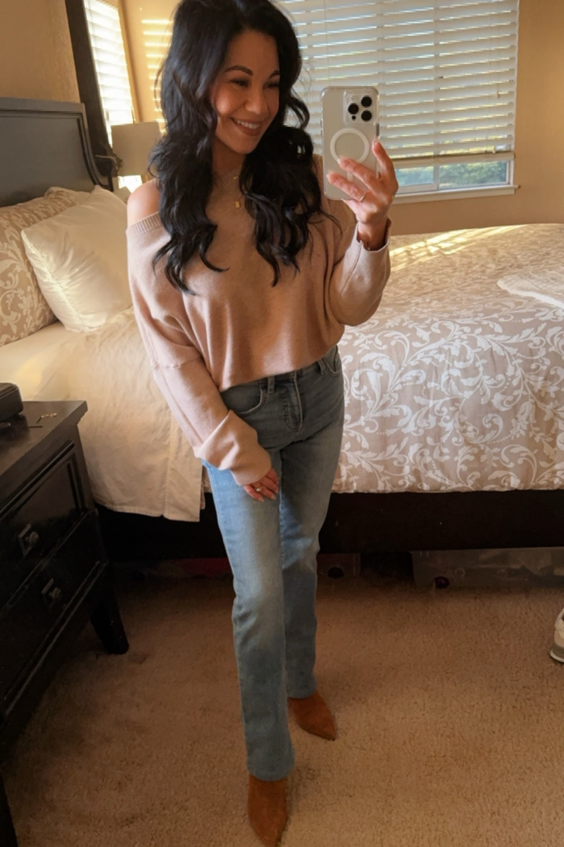 Love this sweater, you can find this exact one on my TT shop. The jeans and booties are below 😉