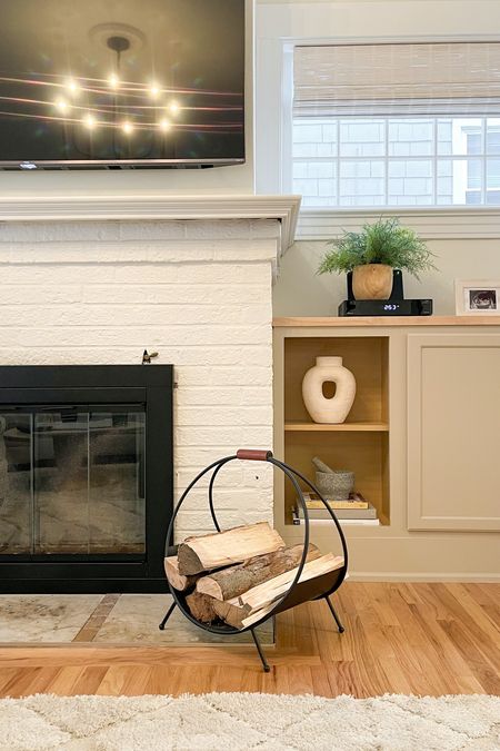 Updated fireplace look for living room with built ins #decor #livingroom #shelfstyling #fireplace #interiors

#LTKhome #LTKFind