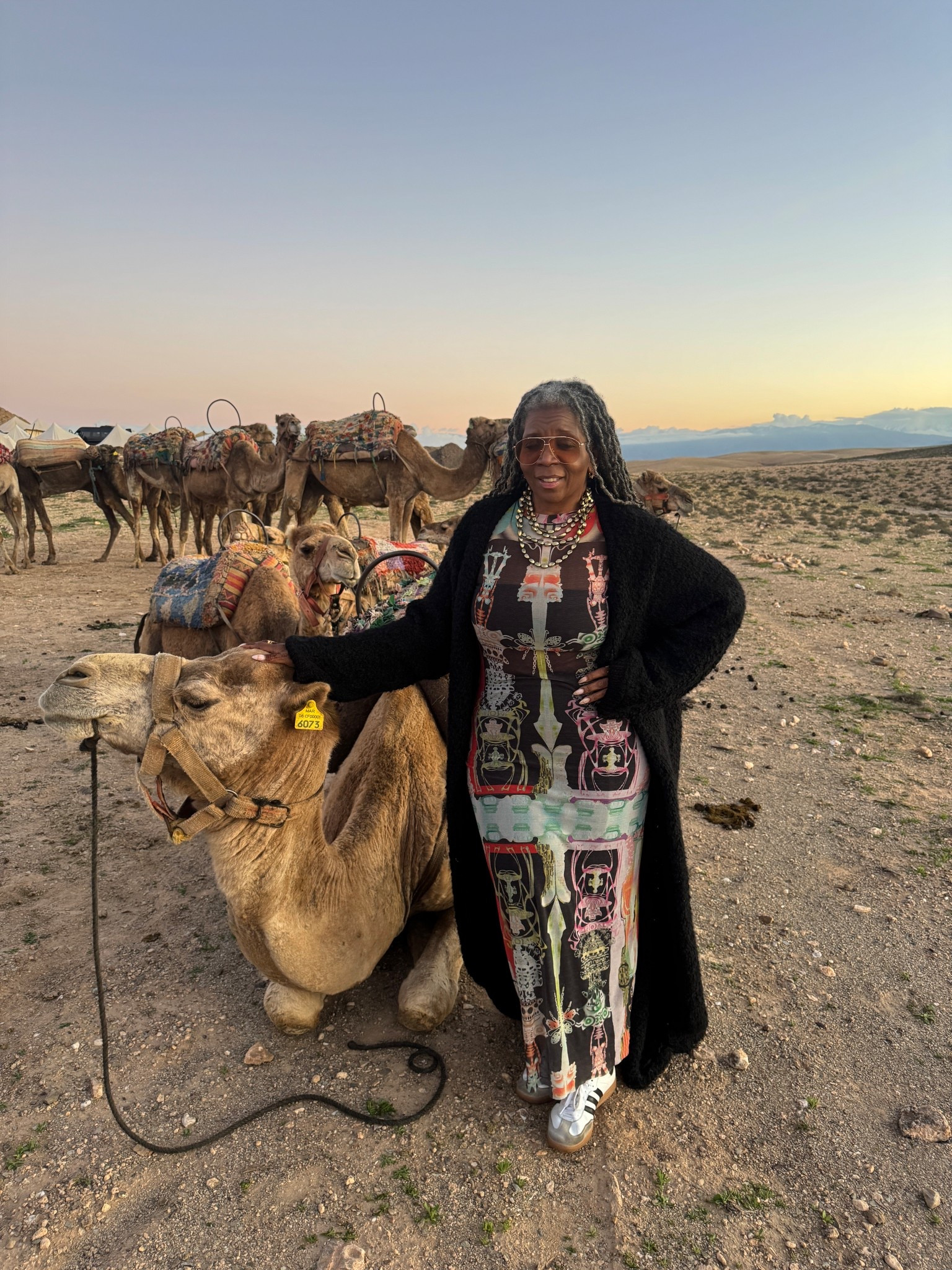 Challenge: what to wear for a camel ride 🐪 🇲🇦 ??? Comfy flexible layers like this colorful Skims dress, over leggings and a camisole. Tip: yes, you will be sandy, dusty and pick up straw so it helps that this dress & sweater are very durable - I also wore it to climb the 272 stairs at the Batu Caves in Malaysia 🇲🇾 . 

#LTKootd #LTKdayinmylife #LTKTravel