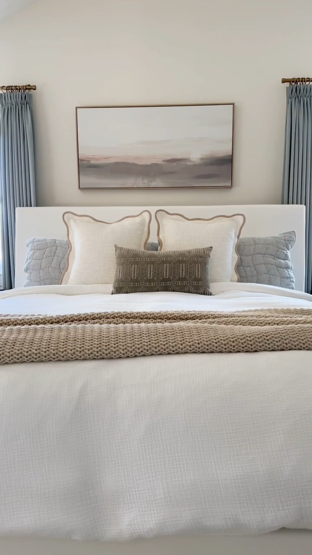 These scalloped throw pillows give a high end look for a lower cost! They’re the perfect coastal touch to our bedding.

#LTKHome