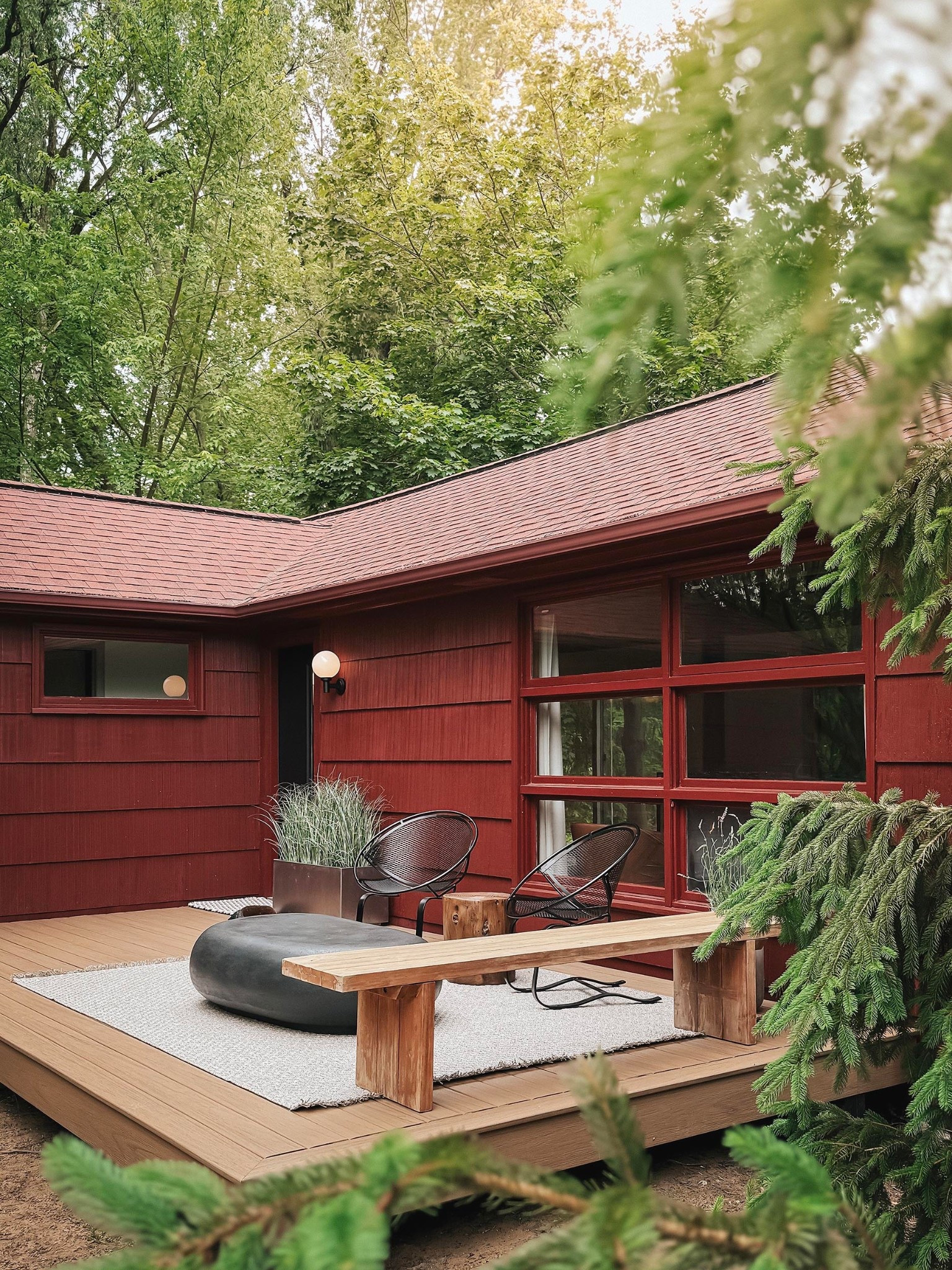 We paired the chairs with a teak bench that also access an impromptu barrier on the high side of the deck. Linked similar

#LTKHome