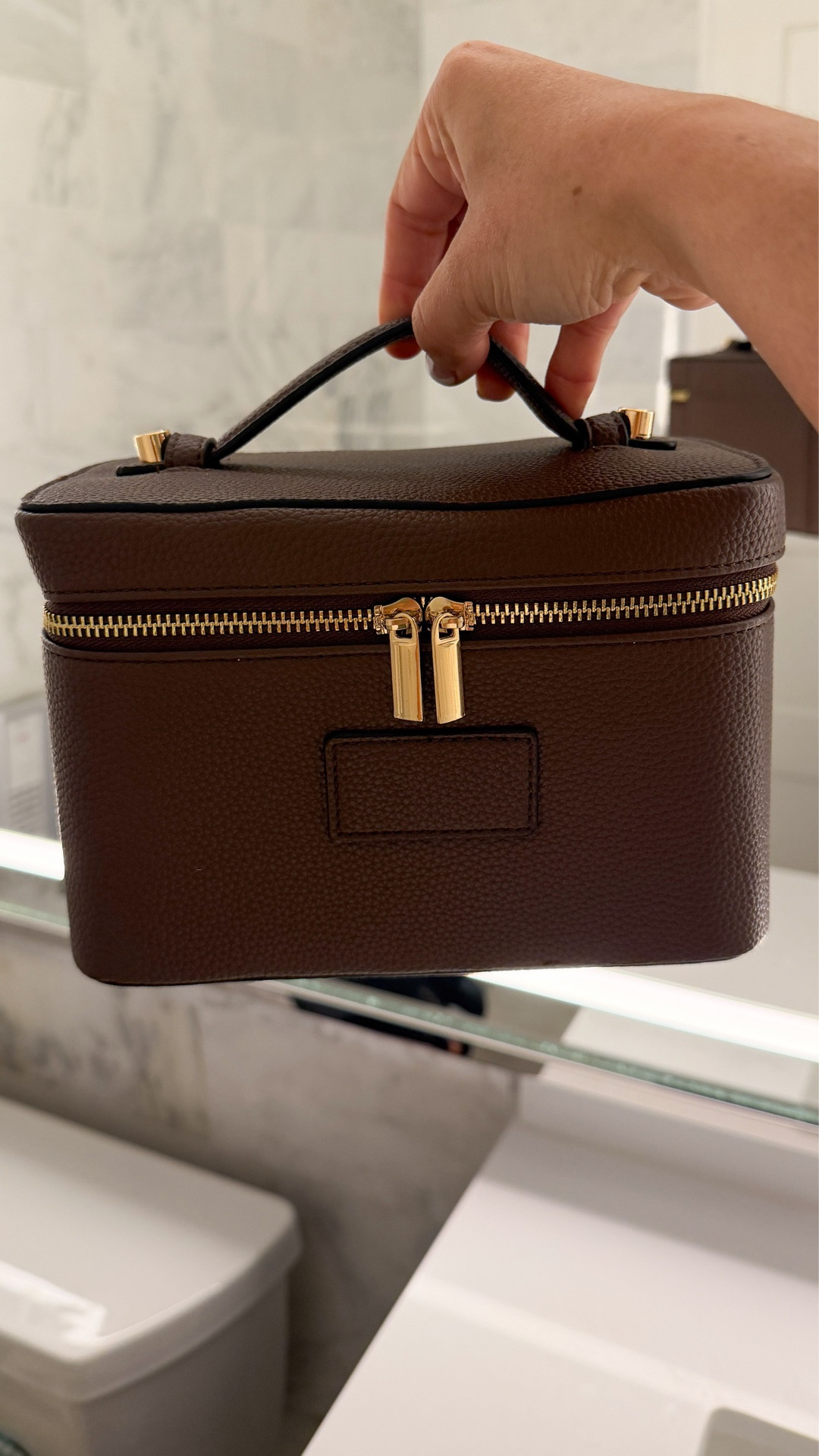 My new Beauty Bag finally came in and I’m obsessed 🤎
It fits everything without feeling bulky — brushes, setting spray, skincare, hair ties, even my lip lineup… all in one place. Such a game-changer for everyday and travel.

Rounded up all of my go-to makeup favorites inside the bag — my everyday base, the bronzer I can’t live without, the lip combo I get asked about the most, and the products that never fail me.

If you’ve been wanting a makeup organizer that actually holds it all (and still looks chic on the counter)… this is the one.

👜 Linked the exact Beauty Bag
💄 + every product I keep inside it


#LTKGiftGuide #LTKFindsUnder50 #LTKBeauty