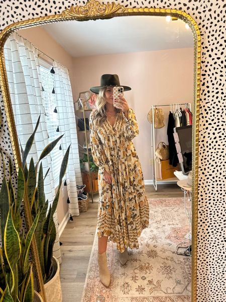 The perfect Thanksgiving outfit! This would also be beautiful for fall family photos! 

Boots
Fall styles 
Maxi dress
Free people 
Hat 
Christmas 
Holiday outfits 

#LTKSeasonal #LTKstyletip #LTKHoliday