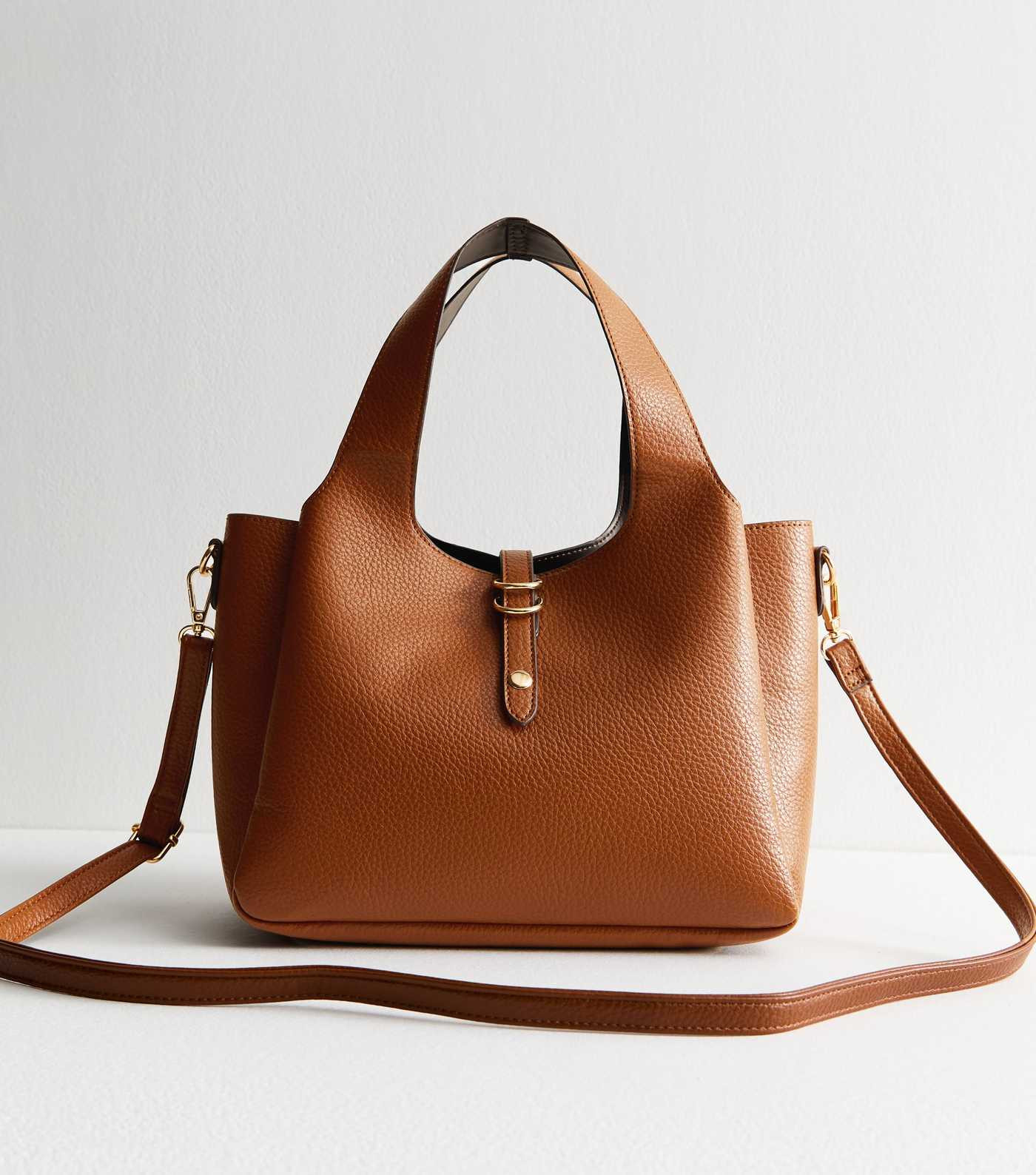 Tan Faux Leather Hobo Bag 
						
						Add to Saved Items
						Remove from Saved Items | New Look (UK)