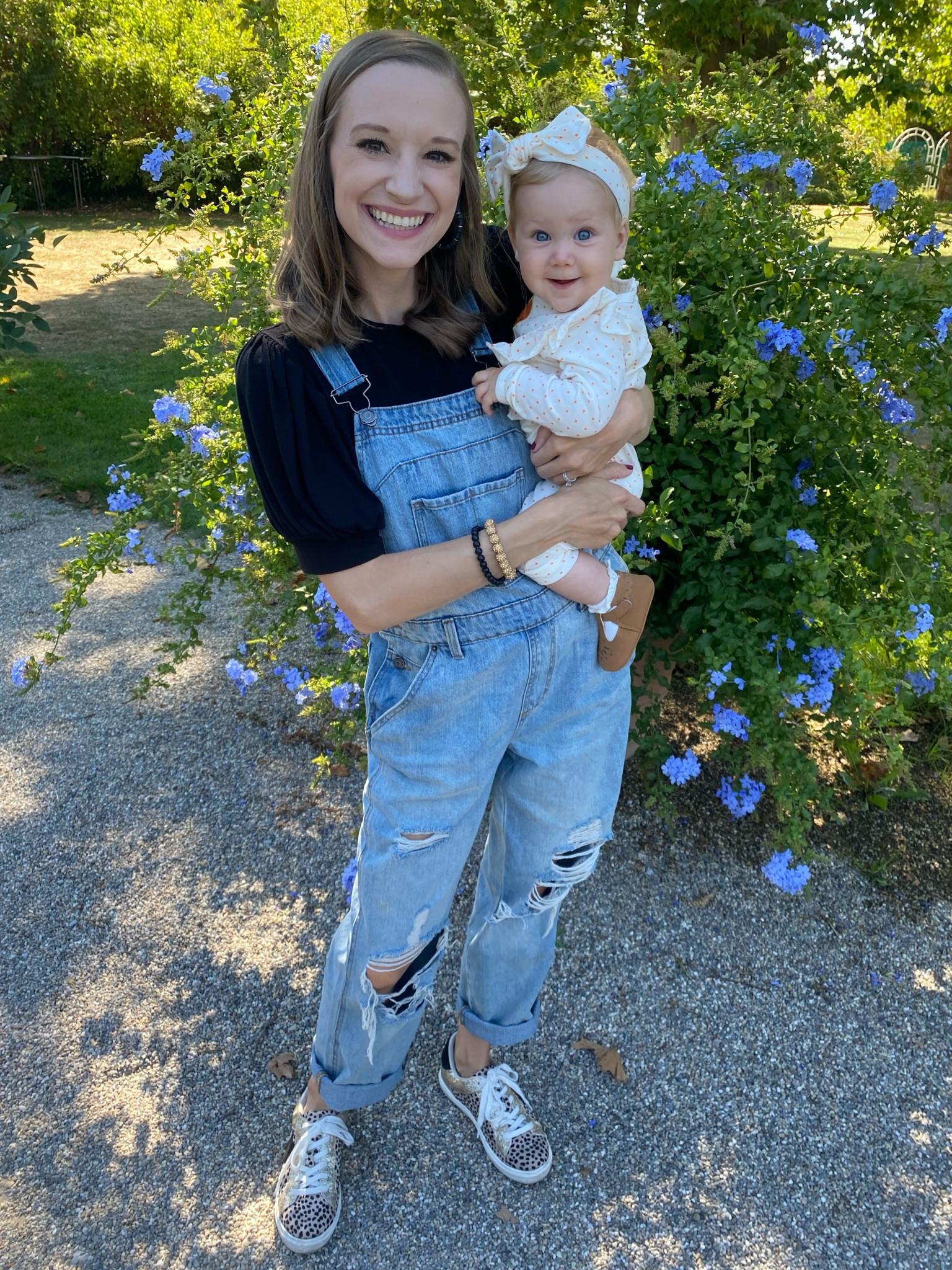 Overalls paired with a black puff sleeve top and golden goose dupe sneakers make for a perfect outfit of the day! 