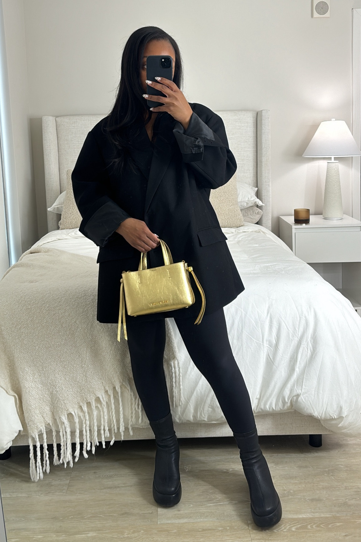 The perfect sock boots! Easy to walk in. Blazer is the boyfriend blazer from The Frankie Shop. Bag is from Bimba Y Lola, it’s so cute!