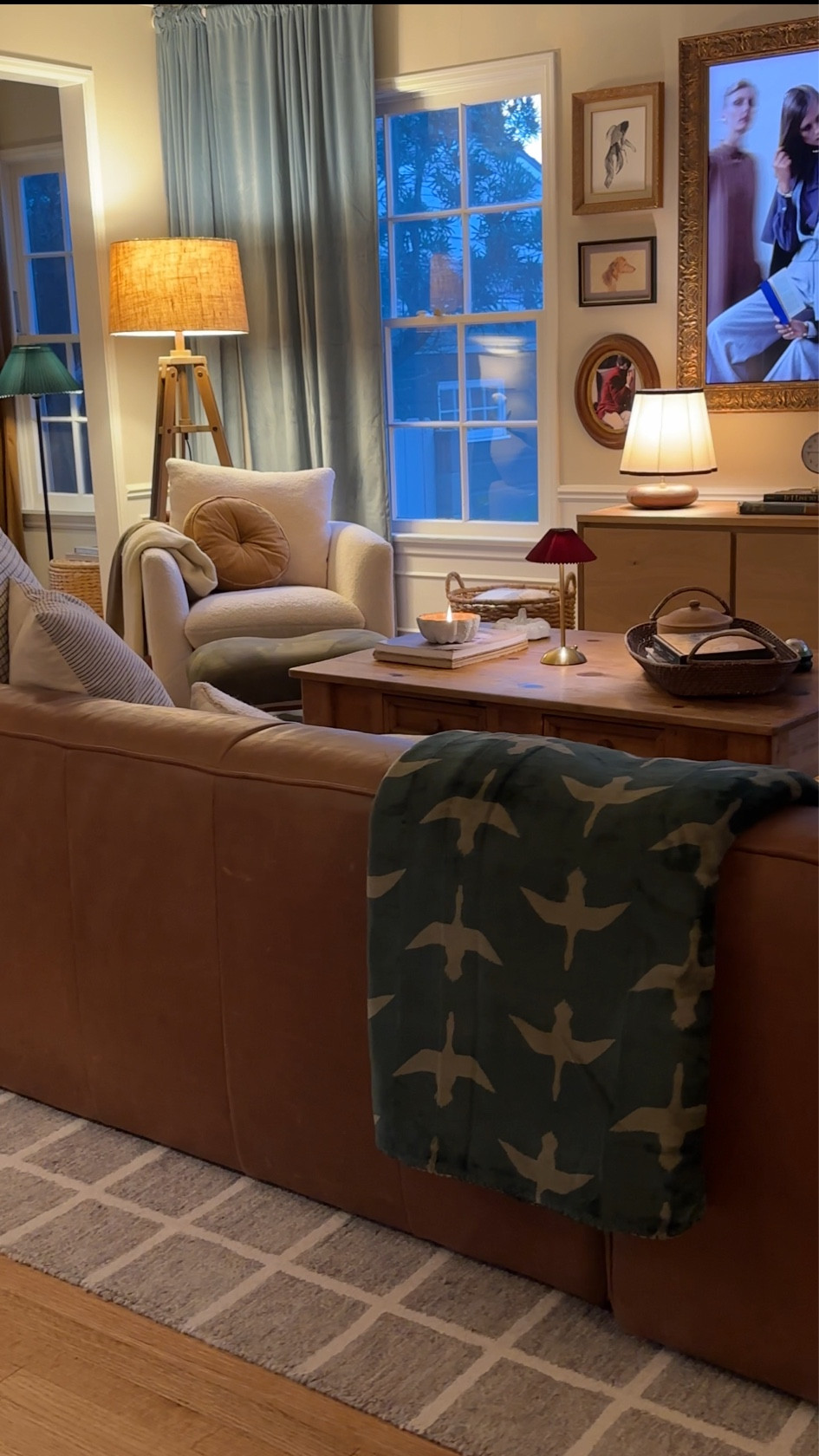 Blankets, pillows, lamps, floor lamp, curtain, tv, tv frame, frame, media console, cabinet, rug, chair, sofa

#LTKHome