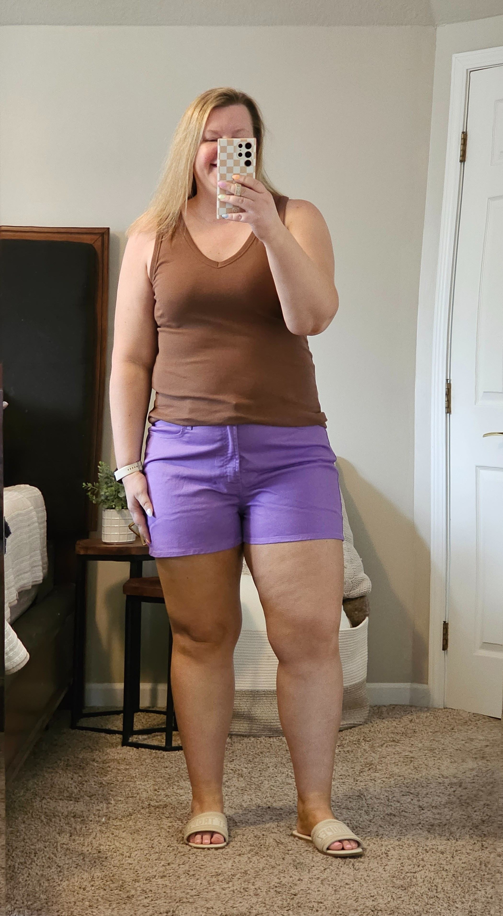 This is my summer casual uniform. A great tank and some shorts!  The tank is an XL and runs a bit small, the shorts are a great violet color and a size 18. 

