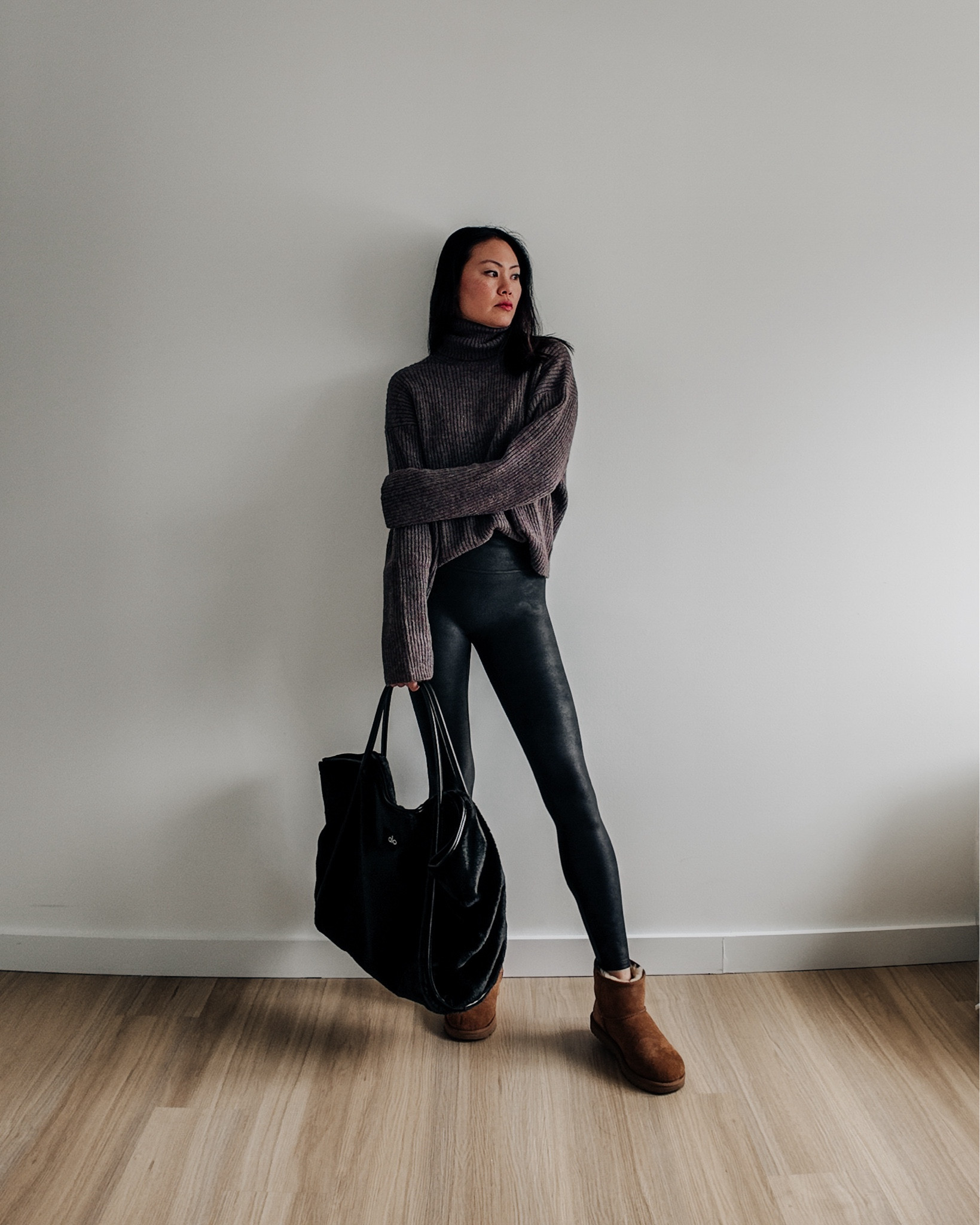Winter outfit. Spanx fleece lined faux leather leggings, oversized turtleneck sweater, Uggs, Alo Yoga faux fur tote  

#LTKstyletip