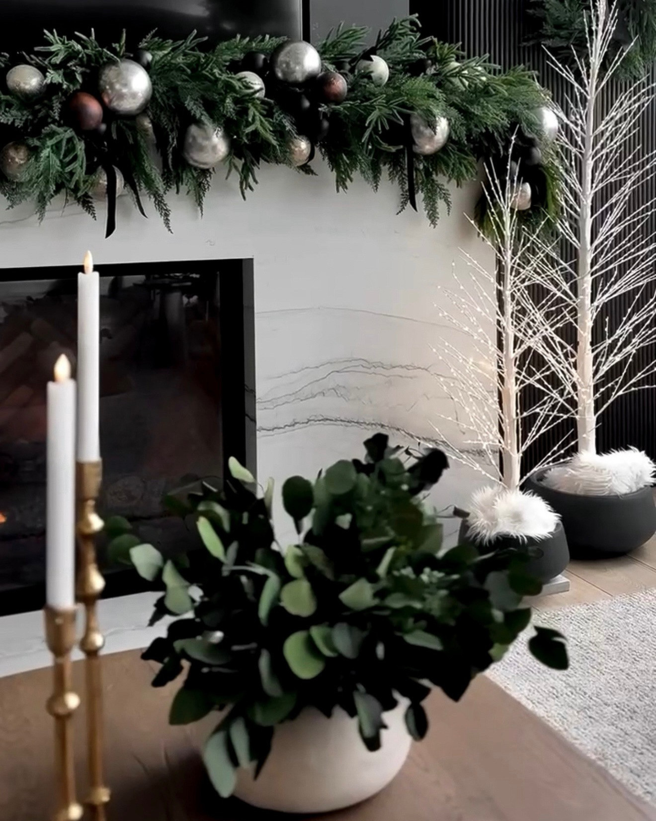 ✨ELEVATED HOLIDAY FIREPLACE · TWINKLING & TIMELESS✨ This space is giving all the cozy elegance — lush greenery, metallic ornaments, and a softly lit twig tree for that perfect holiday glow. The mix of textures and tones creates a refined, modern look that feels festive yet effortlessly relaxed.

#TheHillaryStyle #LuxuryHomeDecor #AmazonFinds #HolidayDecor #ModernOrganic #NeutralChristmas #CozyChic #DesignerLookForLess #HolidayHome #WinterStyling #ElegantInteriors #HomeAesthetic #SeasonalStyling #TimelessDecor #AffordableLuxury 

 #LTKHoliday #LTKSeasonal #LTKOver40