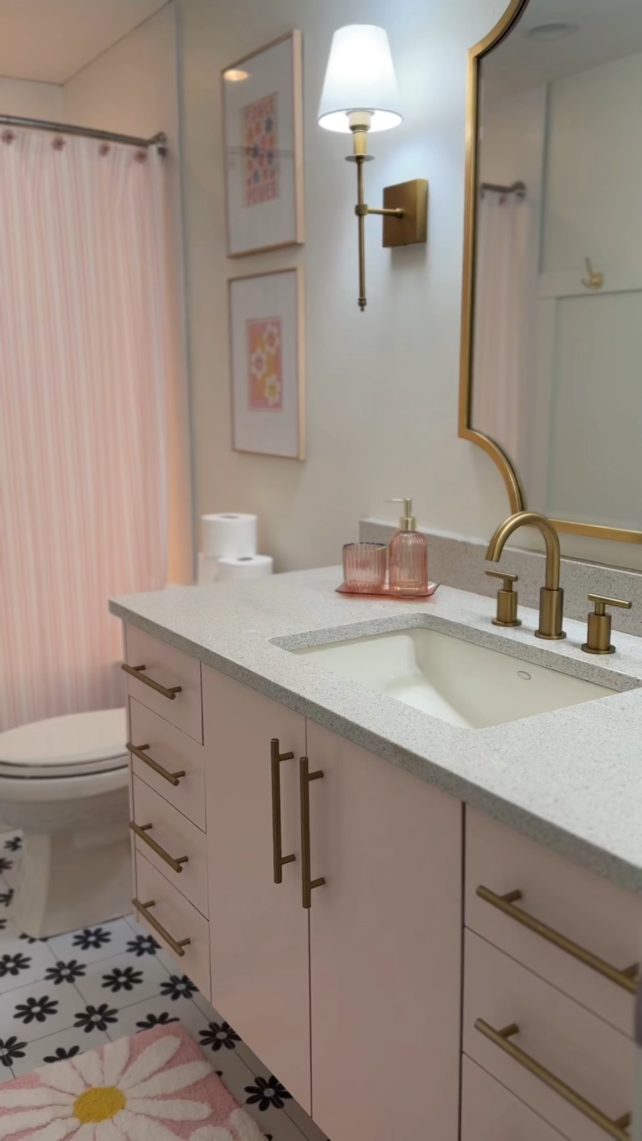 It’s been a full year since I gave my daughter’s bathroom the flower power facelift it needed. I’m still obsessed and smile every time I walk into her bathroom


.
.
.
#pink #pinkpinkpink #pinkaesthetic #guestbathroom #girly #girlpower #girlgang #bathroominspiration #inspo #inspohome #kidsbathroom #flower #flowerpower #floortiles #peelandstick #homereels #bathroomdecor #guestbathroom #flowerpower 

#LTKKids #LTKFindsUnder50 #LTKHome