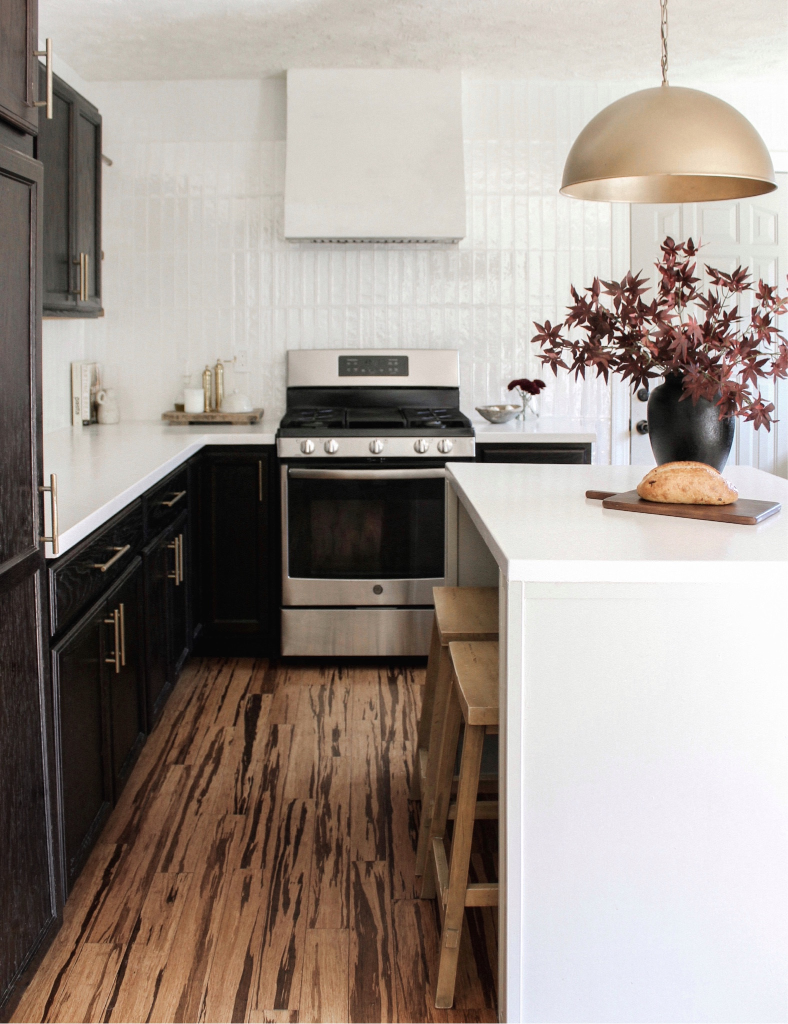 fall kitchen decor 

neutral kitchen. Kitchen decor. Home decor. Kitchen storage. Brass pendant. Island pendant. Kitchen stools. Wood kitchen stools. Charcuterie board. Bread board  

#LTKsalealert #LTKhome #LTKSeasonal