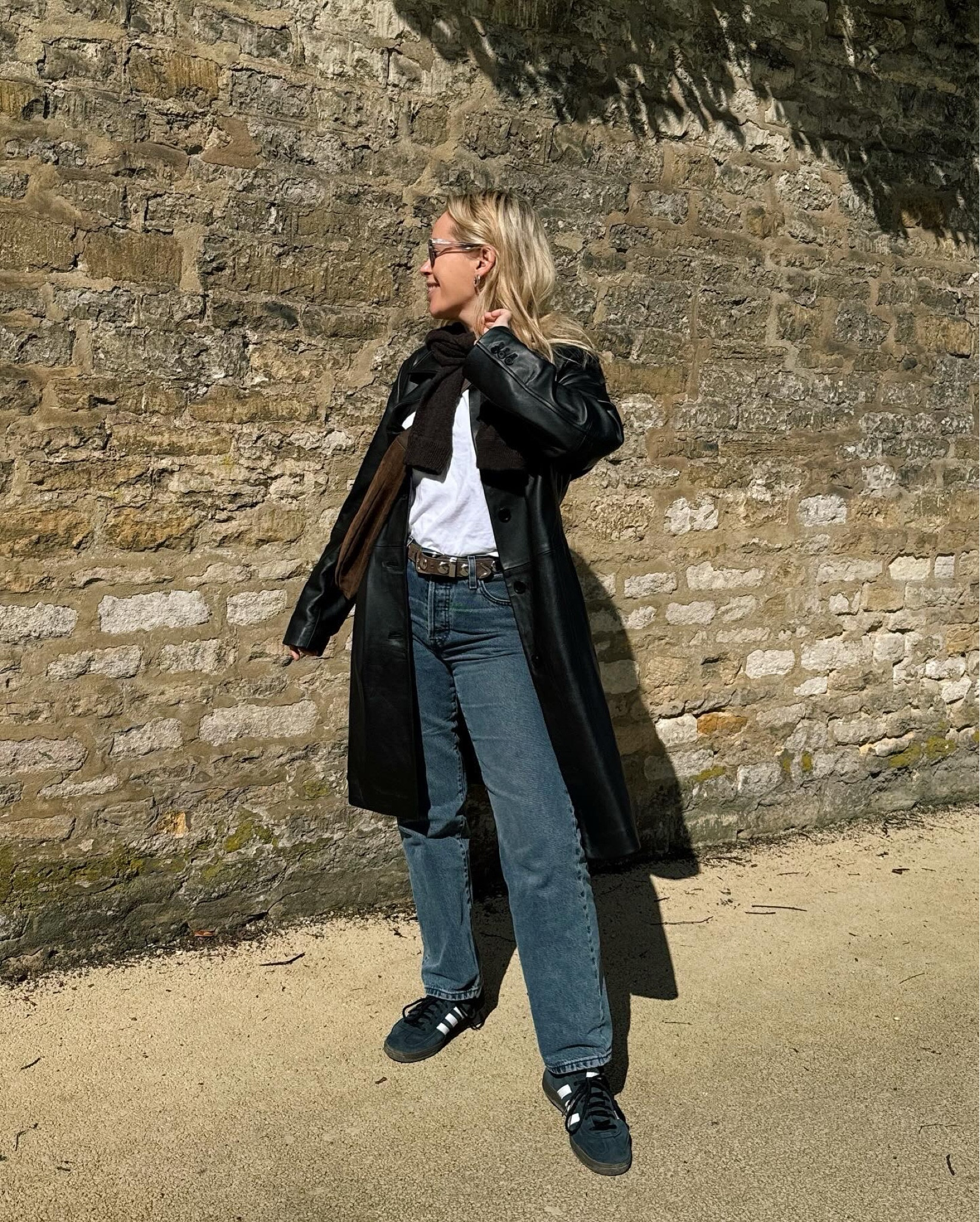 Levis jeans, leather trench coat, adidas handball special, slouch bag, net a porter, white tshirt, cotton tshirt, cashmere jumper 

#LTKSeasonal #LTKeurope #LTKstyletip