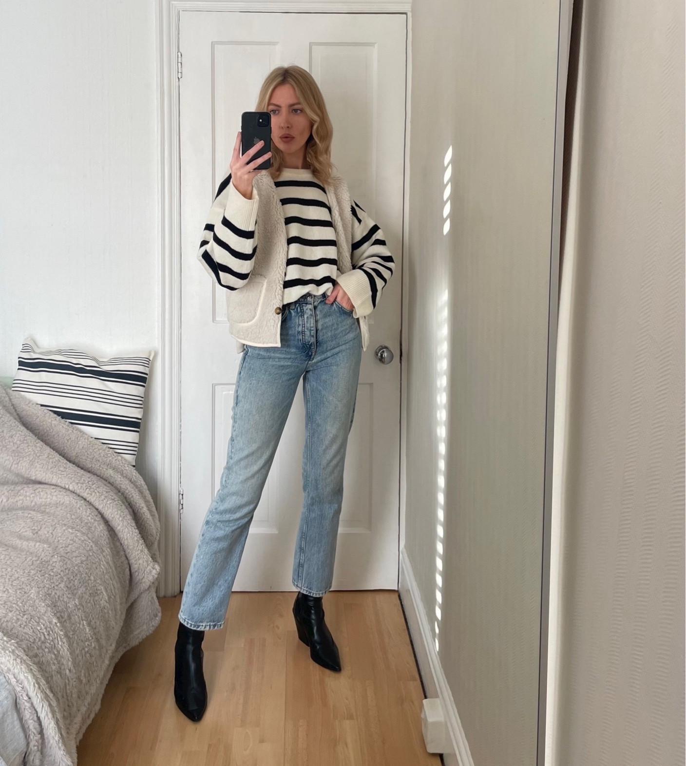 Wearing a size small in this Asos waistcoat and a size small in the stripey jumper. I’ve linked alternative jeans and boots below 

#LTKfindsunder50 #LTKeurope