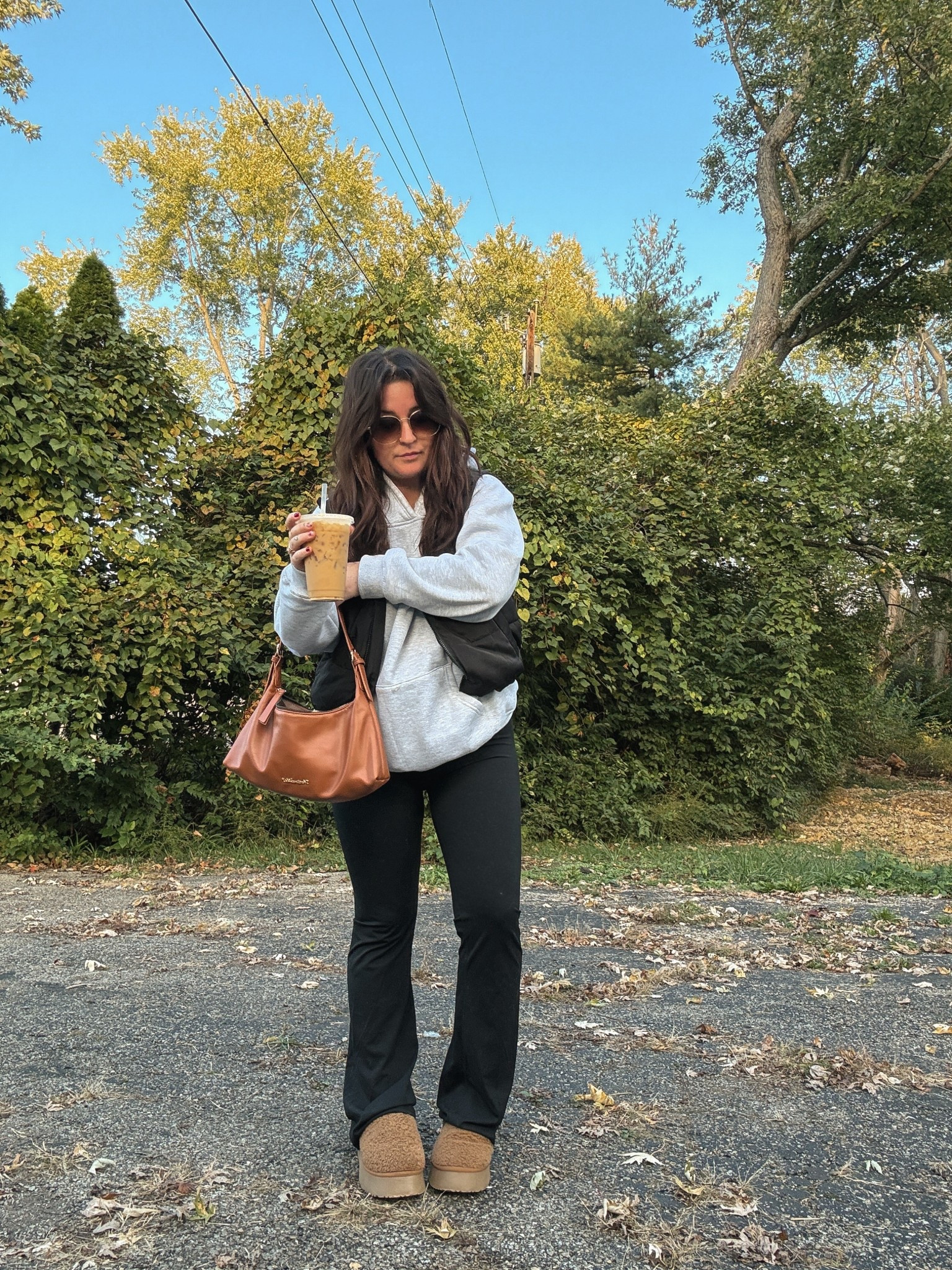 Saturday fall casual errands outfit! Medium in hoodie oversized fit. Medium in crossover flare leggings. Platform slippers run TTS and medium TTS in puffer vest

#LTKootd #LTKPetite #LTKTravel