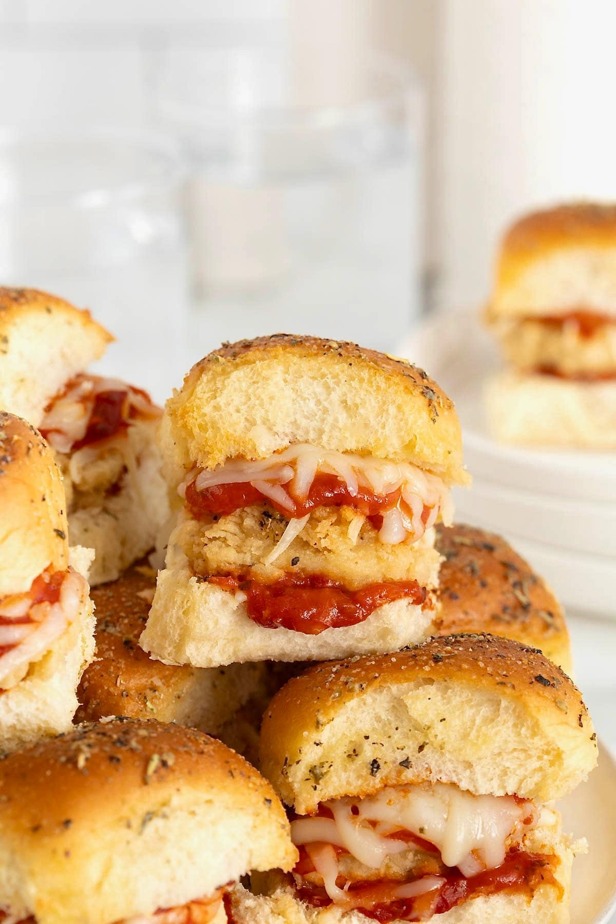Chicken nuggets smothered in marinara sauce and melting cheese on buttery Hawaiian rolls make these Easy Chicken Parmesan Sliders the perfect solution to feeding a crowd deliciously

#LTKHome #LTKParties #LTKFamily