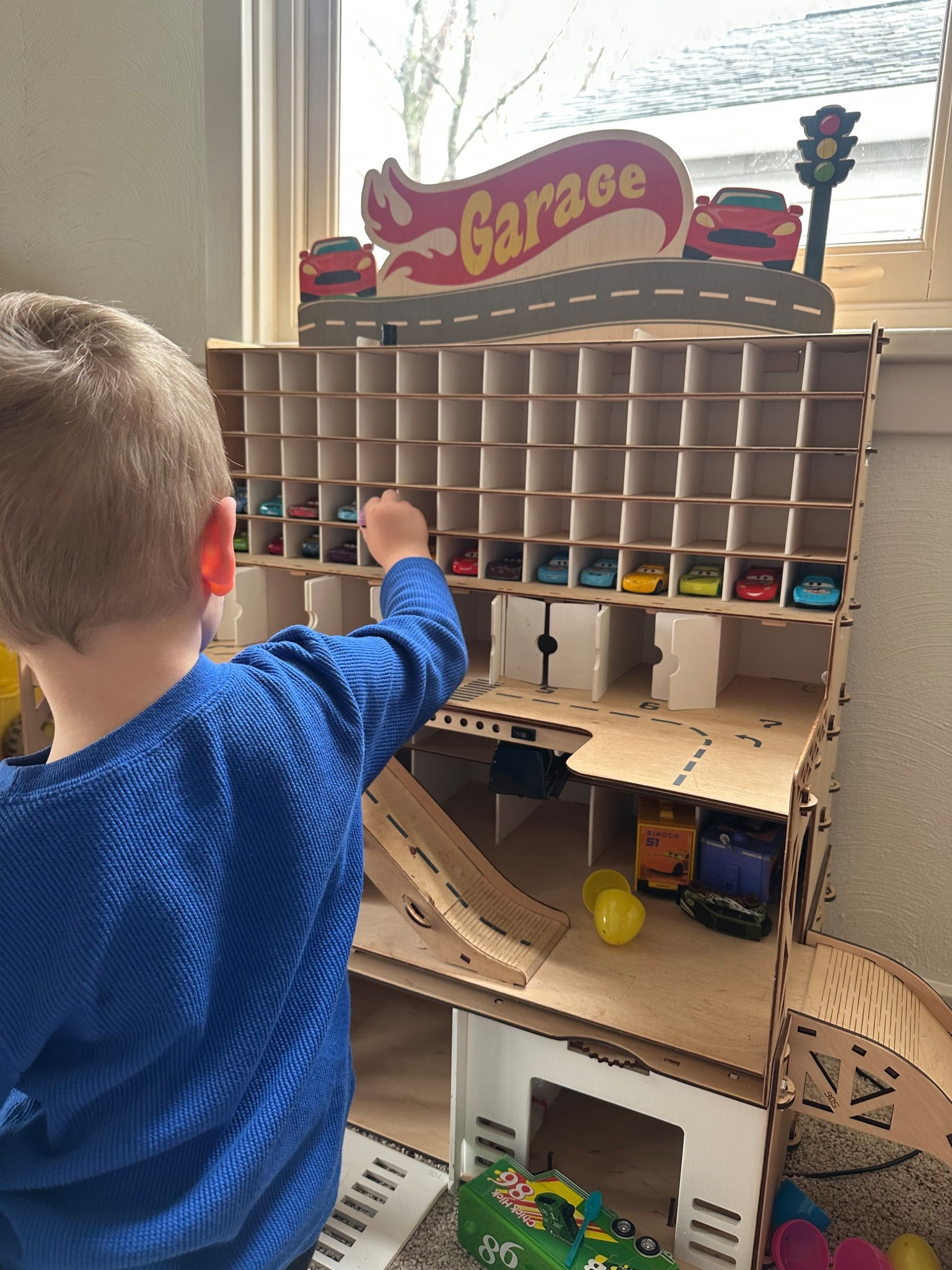 The perfect gift for boys! My son has used this garage every single day for 2 years now. It is so well built and holds all of his cars collection! 

#LTKKids #LTKmomlife