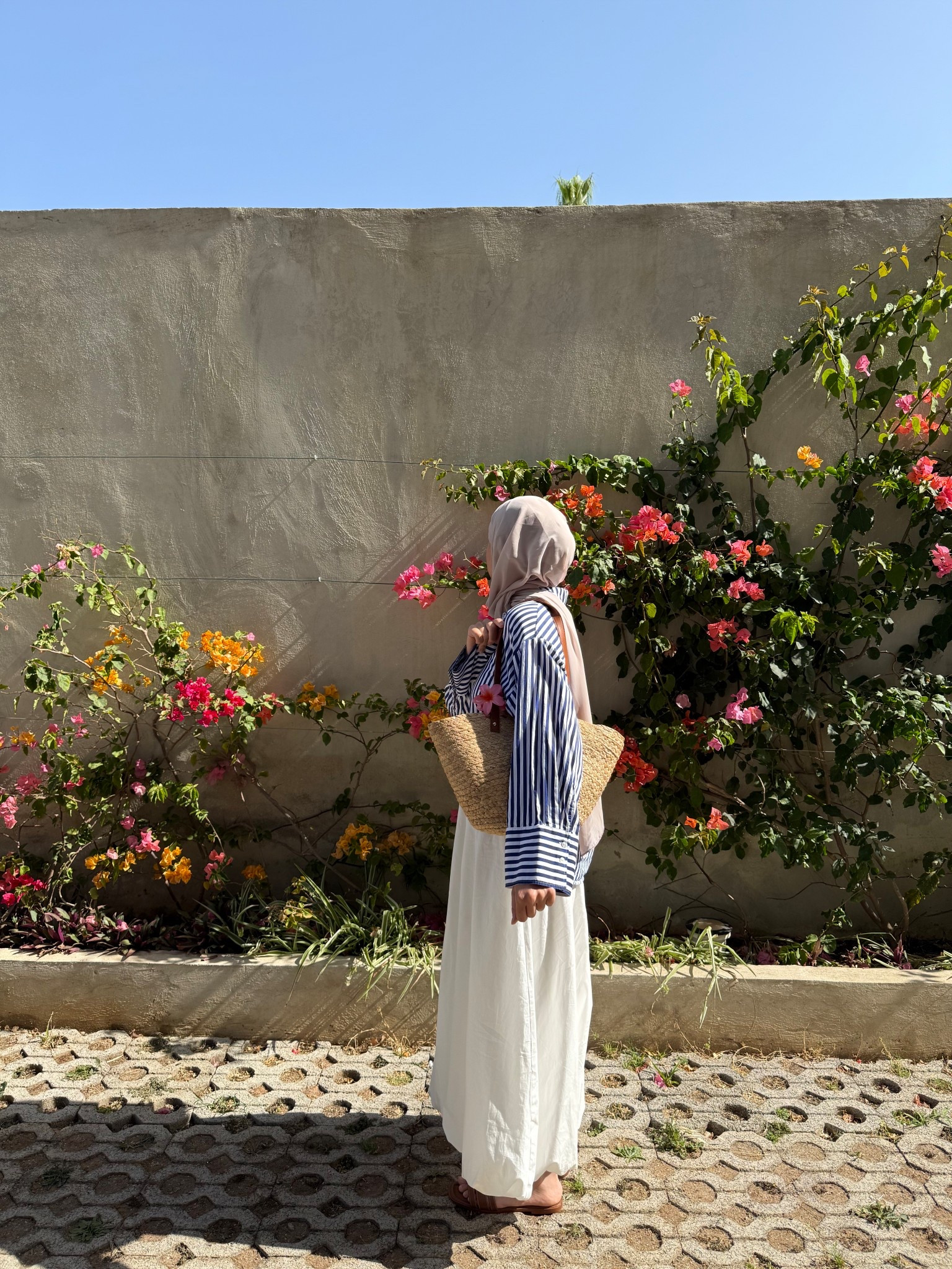 Stripy shirt, balloon white skirt, brown sandals. Straw bag, flower clips, summer outfit 

#LTKsummer #LTKmodest #LTKstyletip