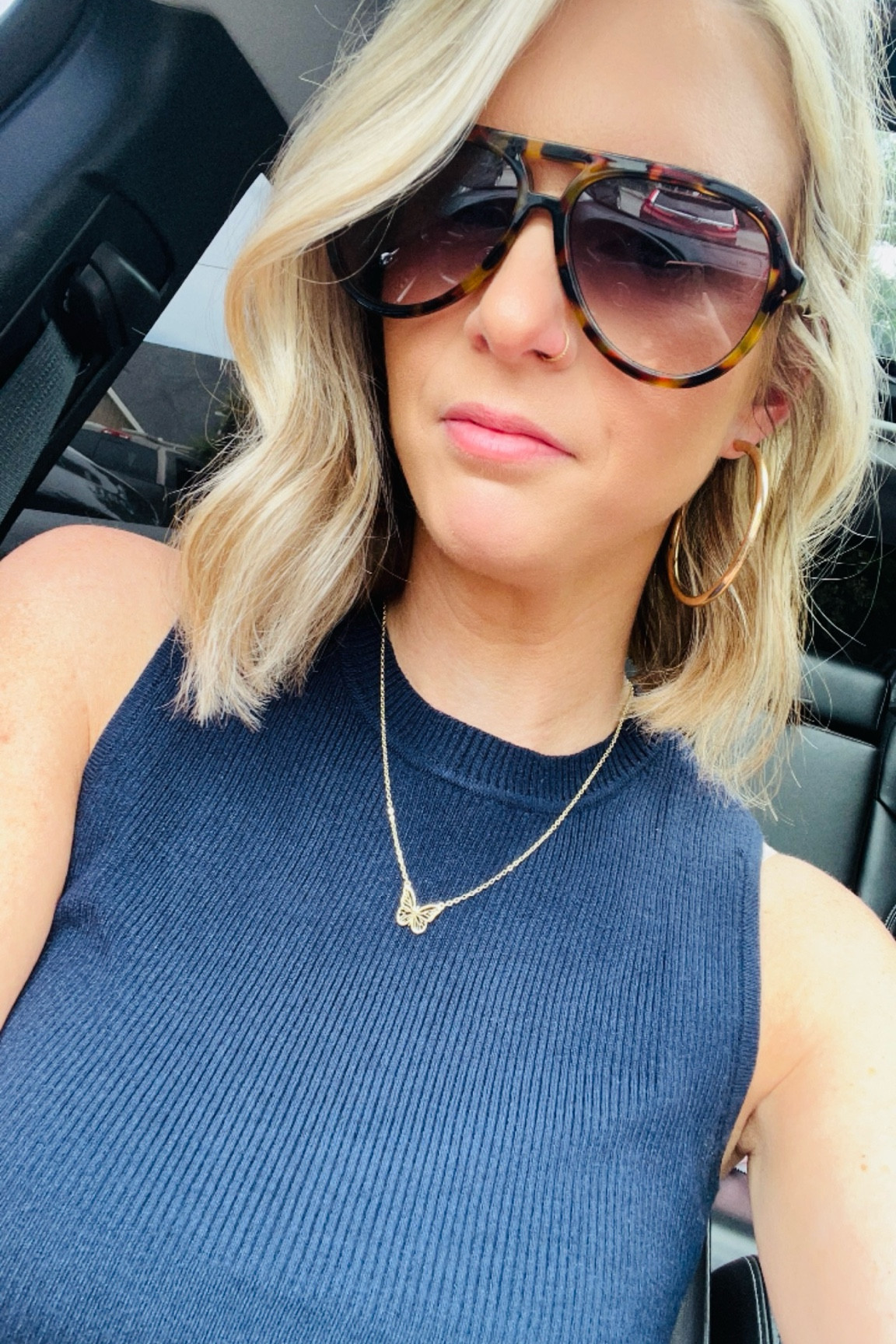 Great sunnies, versatile top and a butterfly necklace. Top run smalls I got a large. 🦋

#LTKBacktoSchool #LTKStyleTip #LTKBeauty