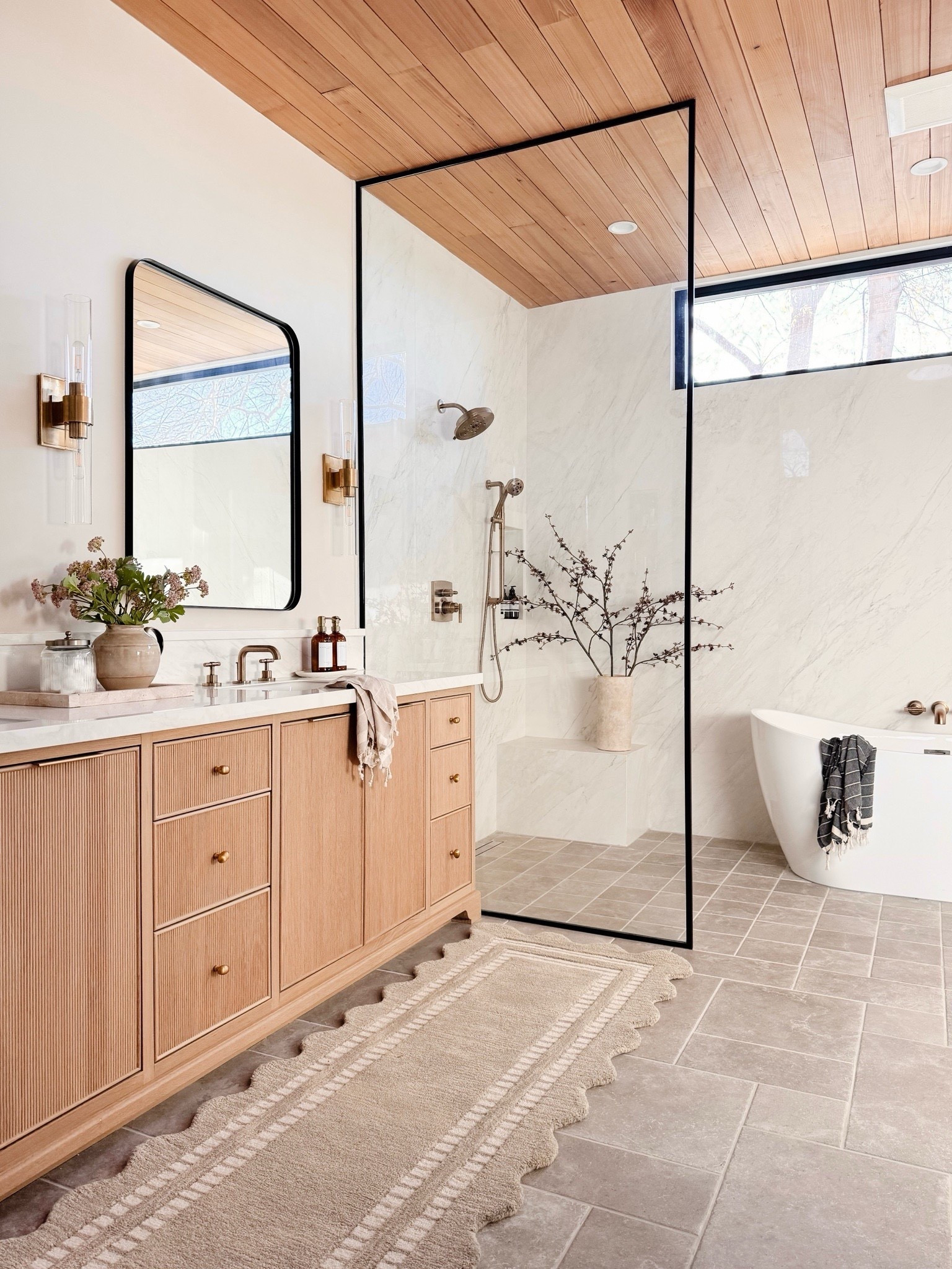 The scallop detail on this runner is SO pretty! I love the warmth it adds to our space and we the perfect little refresh in our space! Such a great price and high-quality.
You can even get a large size rug for only $500! @wayfair #wayfair #wayfairpartner
Gray rug runner, gray tile, white tub, Shower Glass door, black rectangular mirror, bra, sconces, glass, sconces, wood, vanity, shower, plumbing, brass plumbing

#LTKHome #LTKSaleAlert