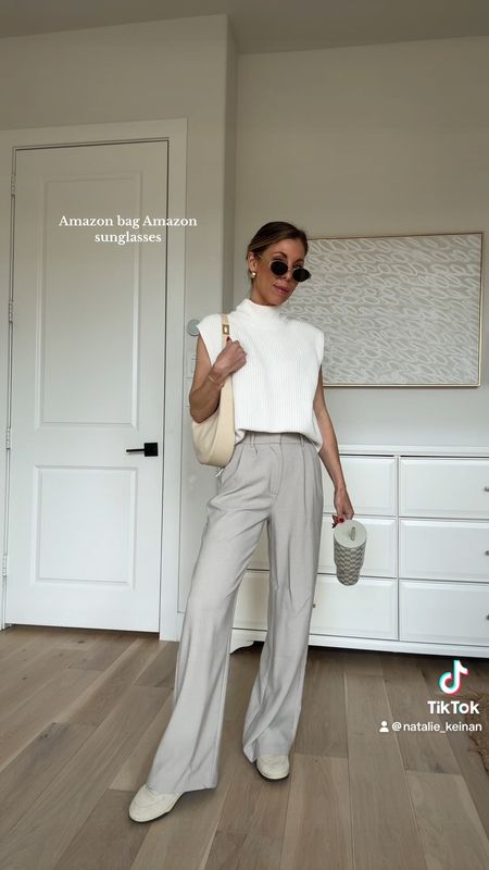 Neutral outfit of the day! My favorite Abercrombie trousers are on sale! I wear a 25. Love this sleeveless sweater too! Amazon bag and sunglasses  

#LTKfindsunder100 #LTKsalealert #LTKstyletip