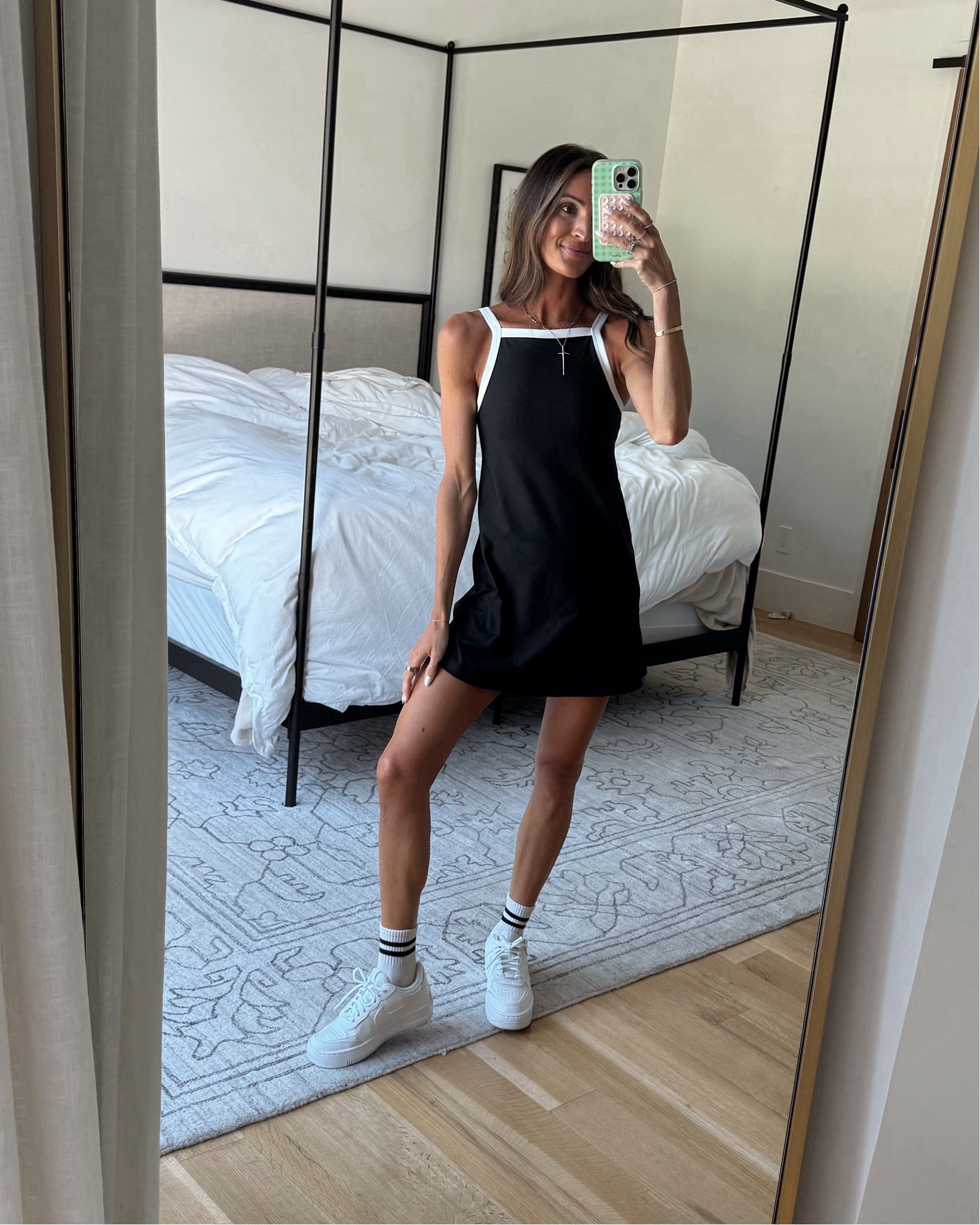 such a fun take on a classic exercise dress! 🖤 love the white detail and apron neckline! runs tts, on sale now 🙌🏻

#LTKFitness #LTKSaleAlert