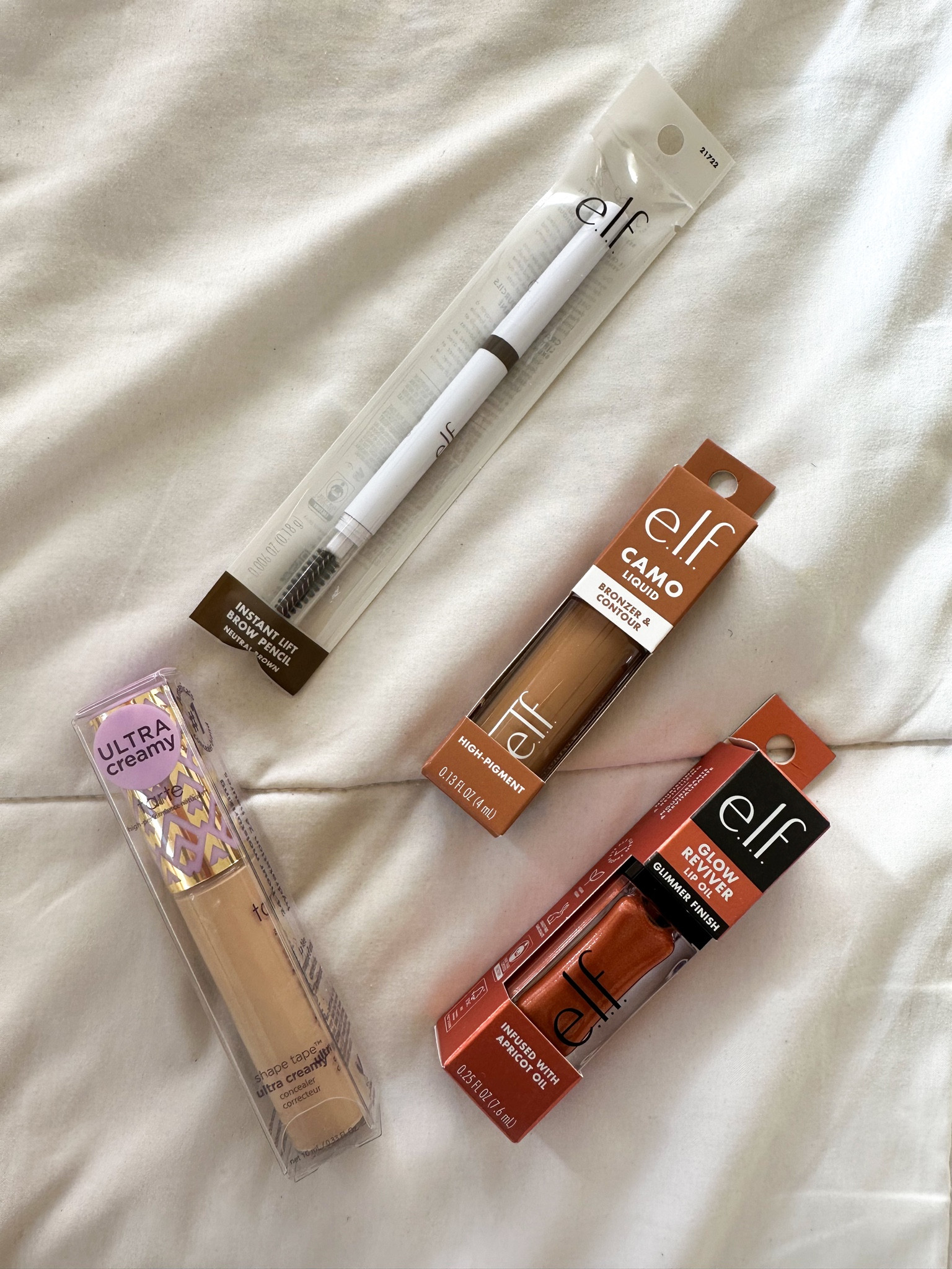 A few things I grabbed at ulta yesterday. Tried the elf camo bronzer/contour and I was actually pleasantly surprised. Also this glow reviver is the prettiest color. Shape tape is still on sale for 50% off! I'm in shade light sand 27s in the creamy version.

Tarte cosmetics, tarte shape tape, ulta beauty, ulta sale, shape tape sale, elf brow lift, elf camo bronzer, elf glow reviver, lip oil, liquid contour

#LTKSaleAlert #LTKBeauty