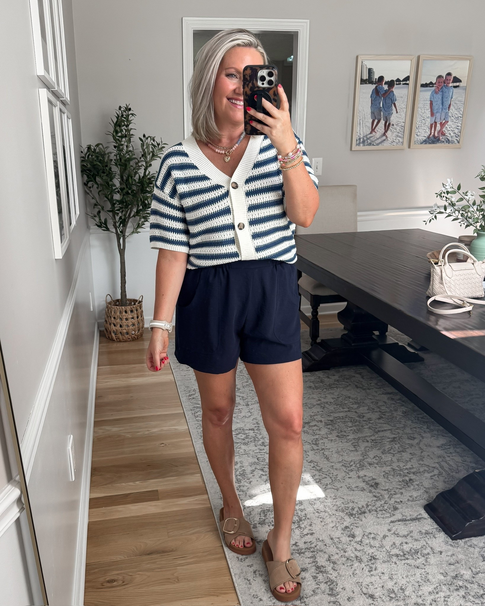 I’ve been loving short sleeve cardigans lately because they’re the perfect in-between piece. They add a little texture without the extra warmth of a full sweater, and they’re just as cute buttoned up on their own as they are layered over a tank or dress.

short sleeve cardigan, knit cardigan, lightweight sweater, fall transition outfit, casual style, layering piece, everyday outfit, boutique fashion, teacher outfit, classic style, lovelylifestyling

#LTKootd #LTKSeasonal #LTKOver40