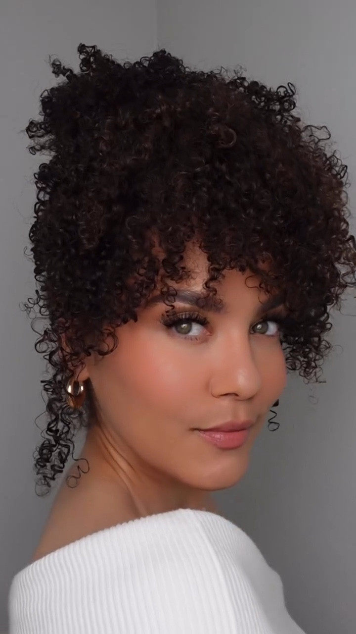 I heard it’s silk press season, but I say it’s curly updo season 🫶🏽

Never let society make you think you need to straighten your hair for any occasion because there is a natural hairstyle any and all occasions. 

We don’t have to alter our hair to be “neat”, “polished”, “formal” or “beautiful”…your curls, waves, coils and kinks are all that and a bag of chips 😉 

Let me know in the comments if you agree with me 👇🏽 

Thx to my stylist @emphasisoncurls for giving me a good cut this past week, bringing my bangs back to do this style. Oh how I missed my bangs :) 

Using only the @emijayinc hair clip to achieve this style 🎀 

#curlyupdo #curlyhairstyles #naturalhairstyles #tighttexturedhairstyle
