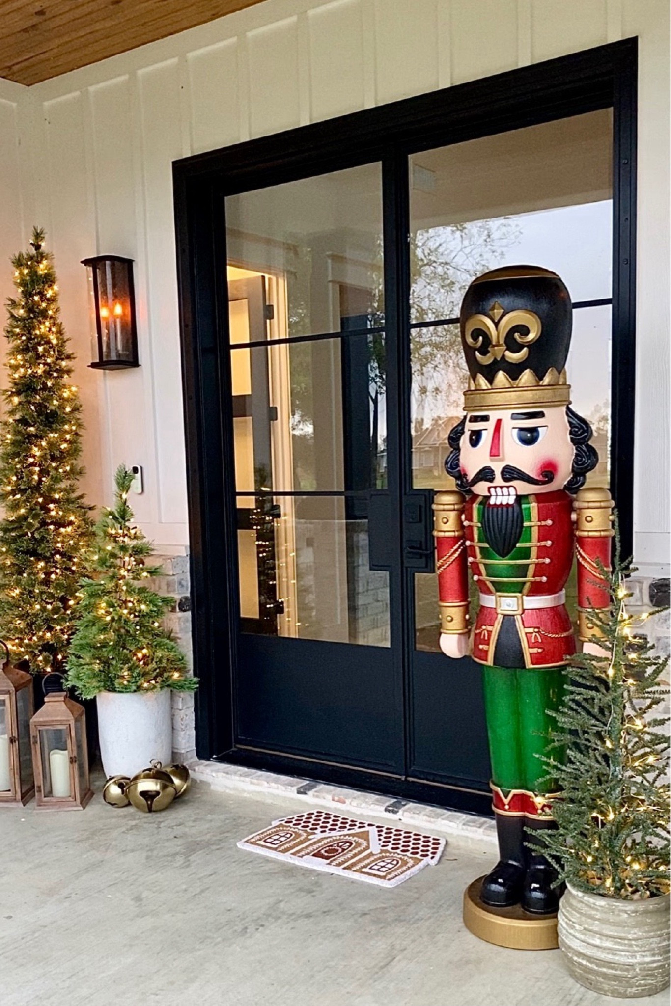 Porch Christmas trees from Walmart! The left is the $70 pencil tree and the $35 4ft tree. The right is a smaller tree that comes with a burlap base. Cashmere Christmas tree. Pencil tree. Giant nutcracker. Walmart Christmas. 

#LTKHome #LTKSeasonal #LTKHoliday