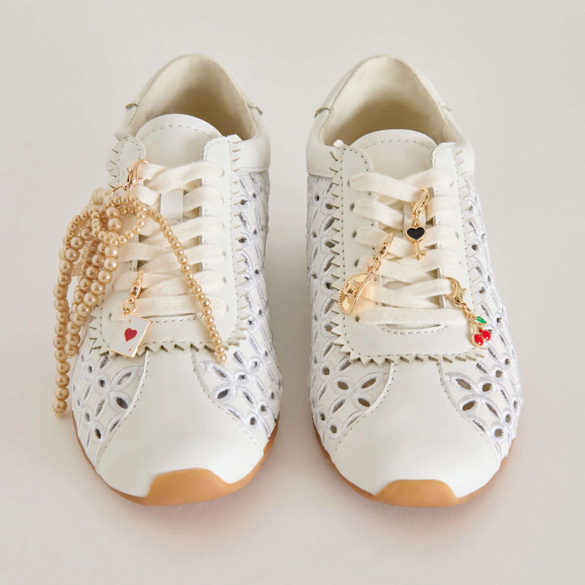 Danie Sneakers White Leather + Gold Bow Charm Bundle | DolceVita.com