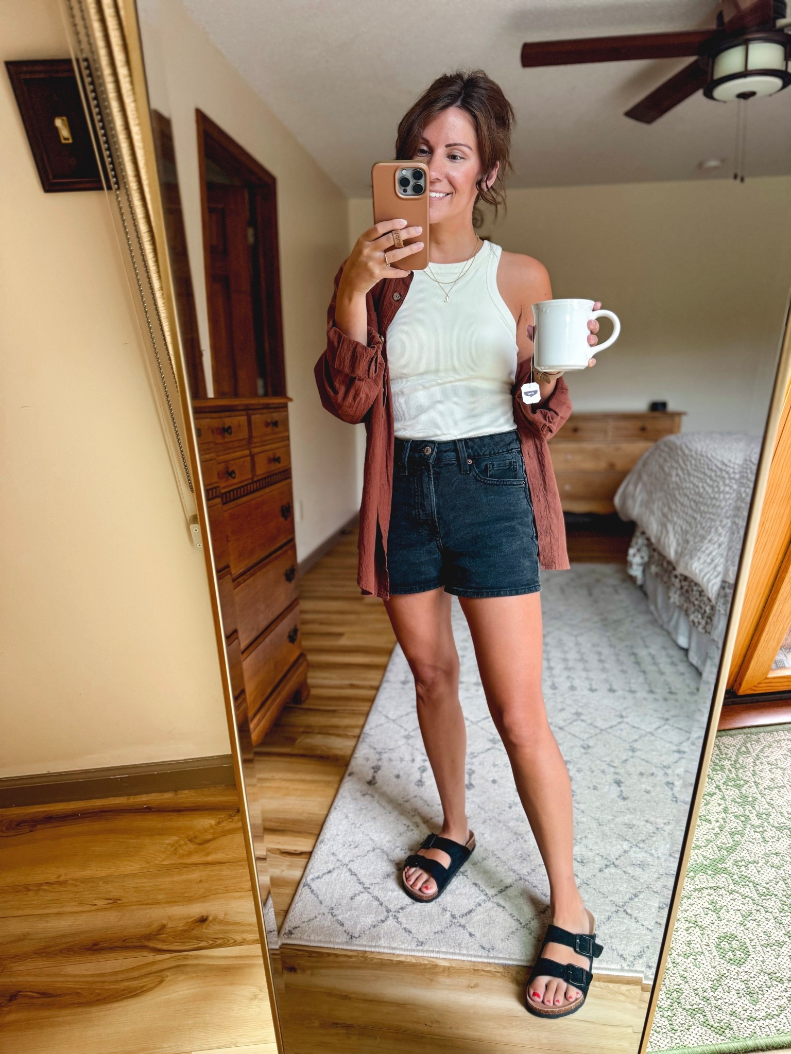 Wearing size small in my tank (it has a built in bra which is SOOO nice). 

My black denim shorts are from last year, so I linked this year’s version (they’re a cutoff instead of hemmed) and also a bunch of similar ones.

My sandals fit true to size
 
My button up is size small in the brown color. I also linked similar because sizes are almost sold out. #LTKSummerEdit

#LTKSeasonal #LTKPetite