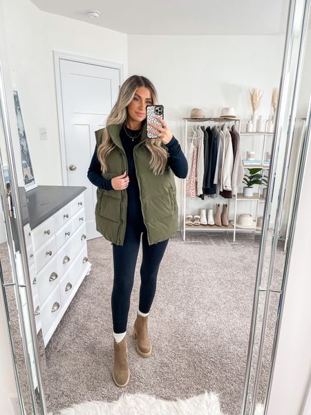 Ten ways to style this green puffer vest from Amazon 🫶🏼 look 4/10 
+ puffer vest: small
+ top: xs
+ leggings: xs 25 inch 
+ boots: true to size 

#LTKfindsunder50 #LTKSeasonal #LTKfindsunder100
