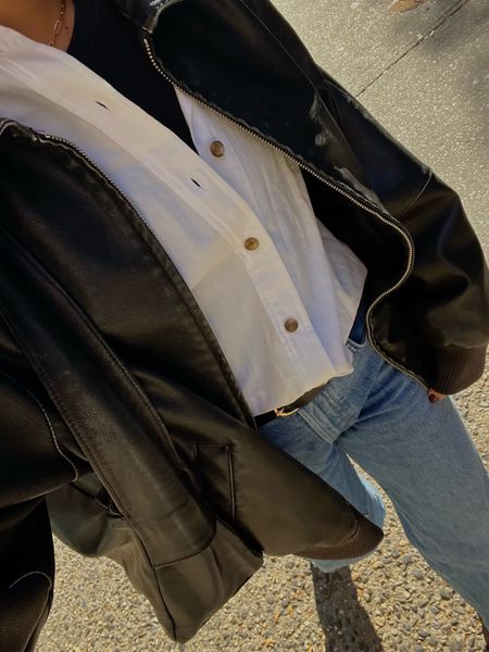 oversized faux black leather jacket that can be dressed up or down! i wear mine everyday.  paired here with an oversized solid white button down, basic black tank, and high rise curve love jeans. 