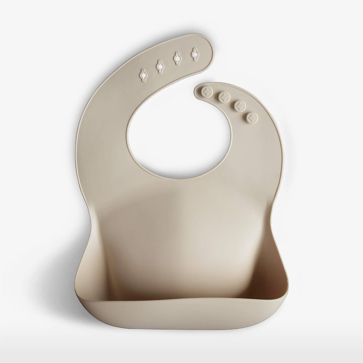 Mushie Tan Silicone Baby Bib with Pocket + Reviews | Crate & Kids | Crate & Barrel