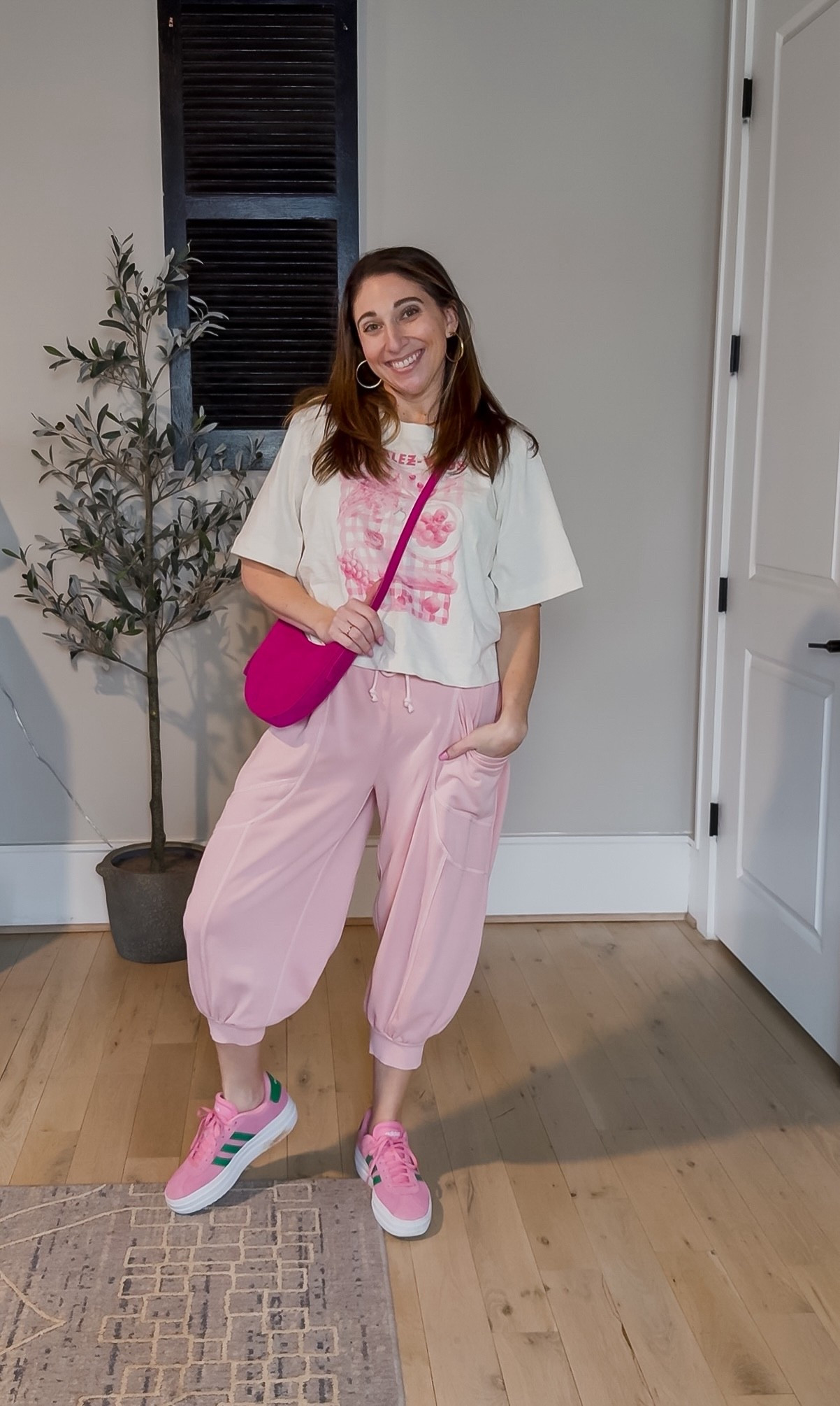 Comfy, cute, and covered in pink! These pink joggers are going to be in constant rotation this spring and summer! HIGHLY recommend! And this crop graphic hits at the perfect spot for a tiny front tuck! Don’t even get me started on my pink accessories to finish it off?! Do you love this look as much as me??
Tee M / Joggers M / Sneakers tts 

#LTKMidsize #LTKmomlife #LTKootd