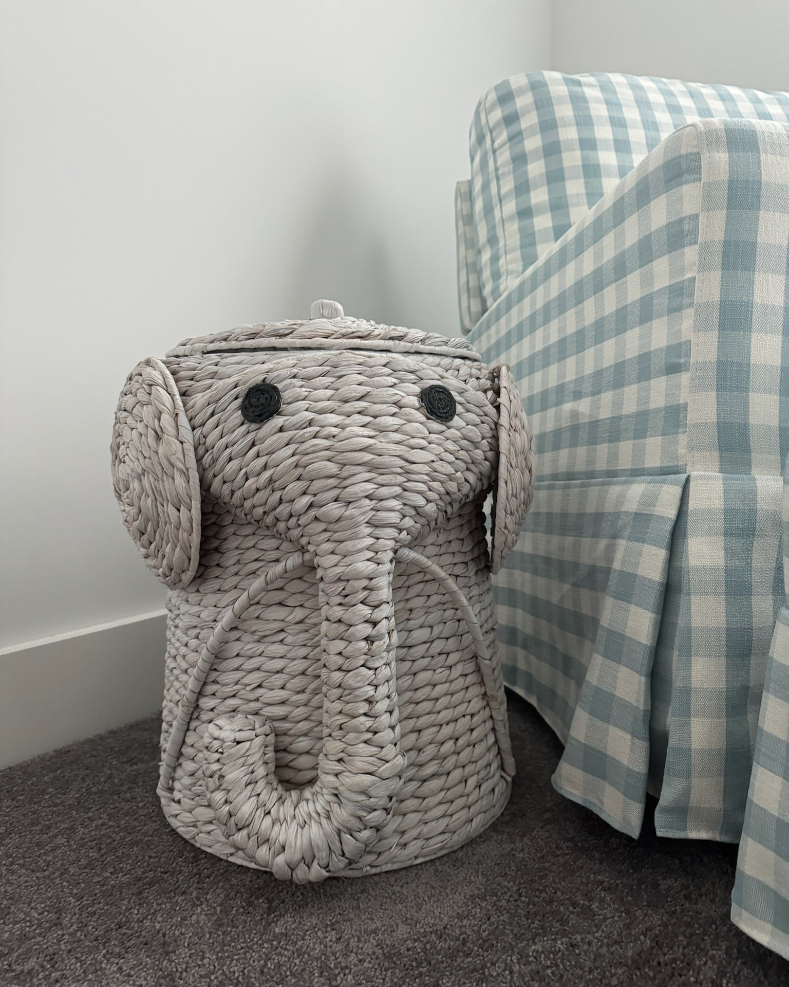 Wicker elephant hamper/basket and gingham swivel glider and ottoman for baby boy nursery 

#LTKHome #LTKKids #LTKBaby