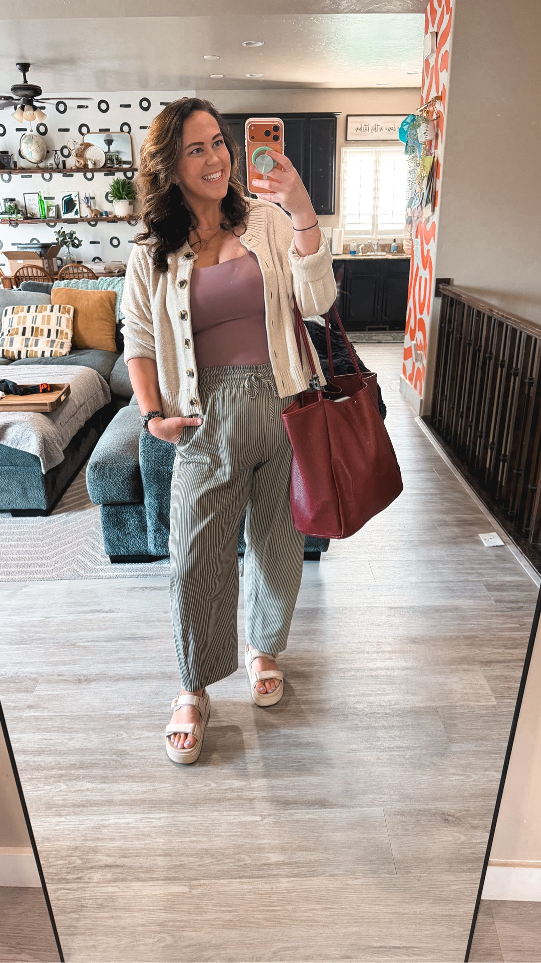 Day 22 of dressing our squishy mom bods for work this summer 🙌🏼 Did we choose the right bag? 😁 Don't forget to mix the fun colors like these together! Love how breezy these pants are for summer/fall! 🤌🏼

Pants: size XL
Tank: size XL
Cardigan: size XL

Size 14/16 | L/XL | 5'9 | 38DD

color mixing outfit, striped pants summer fall, mauve tank top, cream cardigan midsize, breezy pants transition outfit, size 14/16 workwear, squishy mom bod outfit, corporate but comfy

#LTKTall #LTKMidsize #LTKWorkwear