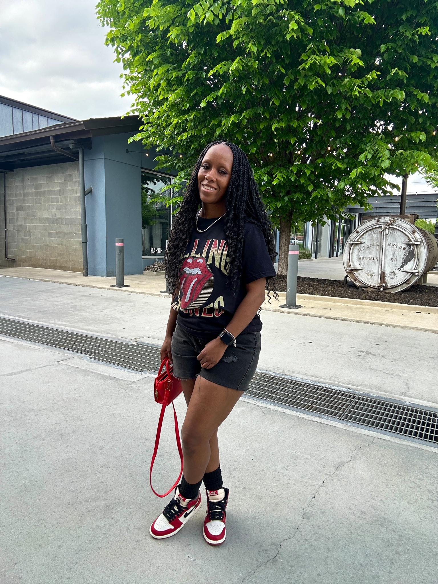 Casual summer outfit idea. I’m wearing a Rolling Stones graphic tee that I got from Walmart with black denim cutoff shorts and a red mini crossbody bag.

#LTKfindsunder50 #LTKFestival #LTKstyletip