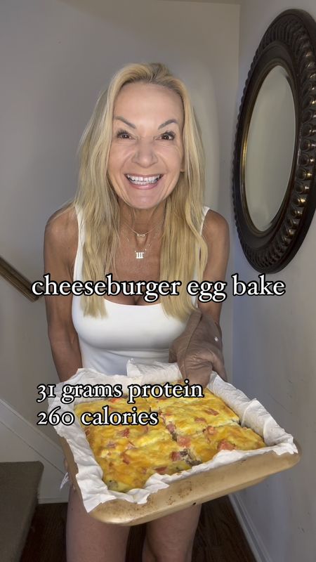 CHEESEBURGER EGG BAKE- 31 grams protein, 260 calories 

1/2 yellow or white onion, diced 
1 pound extra lean ground beef 
8 eggs
1 cup 2% cottage cheese 
1 diced Roma tomato
1/2 cup shredded mild cheddar 
salt and pepper 

Preheat oven to 350. Line an 8x8 inch baking pan with parchment. 

Lightly spray a large pan with avocado oil and sauté onion until it starts to soften. Add ground beef, season with salt and pepper and cook until fully done. 

Meanwhile combine eggs and cottage cheese and blend until completely smooth. 

When beef is cooked spread evenly over the bottom of baking dish and pour egg mixture over it. Top with diced tomato and shredded cheddar and additional salt and pepper. 

Bake at 350 for 35 minutes or until lightly browned and set in the center. Cut into 6 pieces. Tastes great hot or cold!

Are you going to try this?

xoxo
Elizabeth 







#LTKover40 #LTKVideo #LTKhome