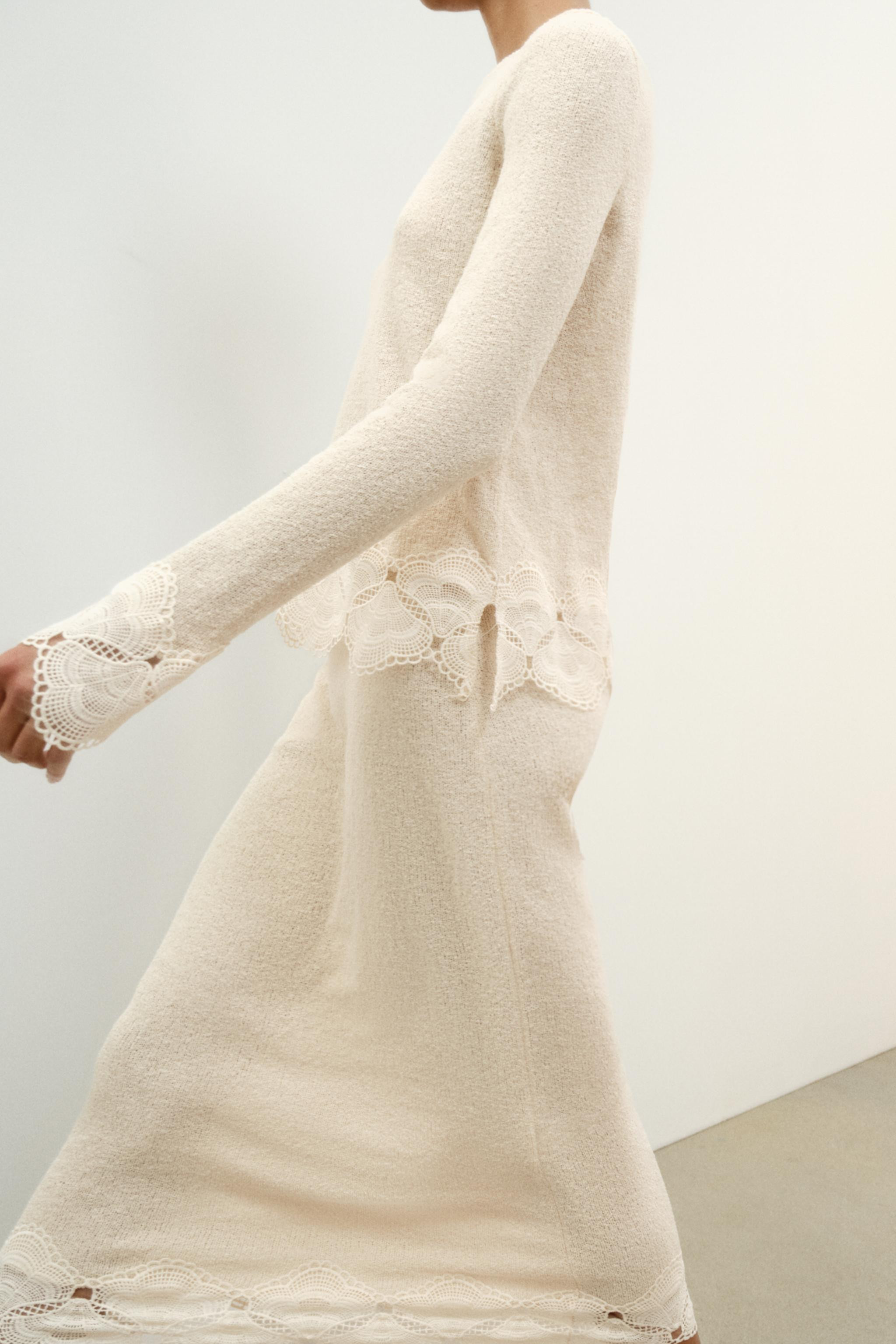 Top crafted from rustic fabric, featuring a round neck, long sleeves, and a matching crochet appl... | Zara UK