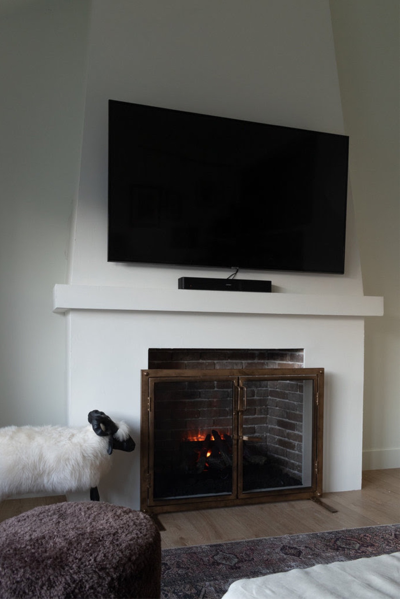 Our electric fireplace insert, brass fireplace cover, lava rooks, living room decor 

#LTKhome #LTKSeasonal