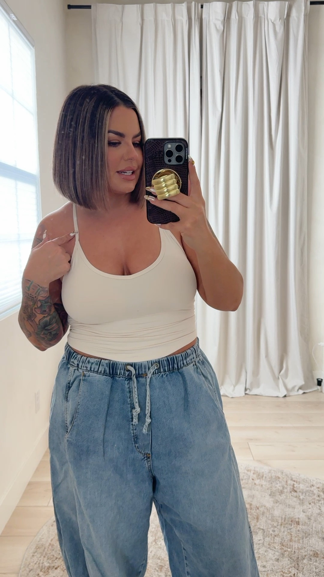 Tank - cream white size L 
Jeans size down I’m wearing a M 
Sandals are old no link sorry
JEANS SOLD OUT